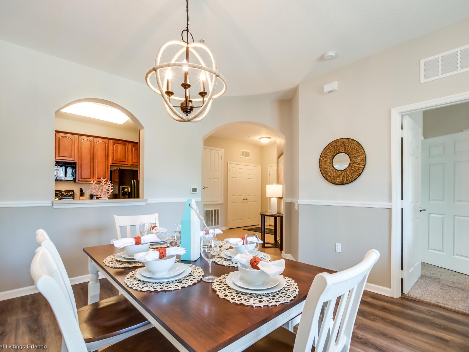 The dining area is a tastefully appointed space, inviting guests to savor not only delicious meals but also create lasting memories amidst the sophisticated ambiance of this stylish retreat.