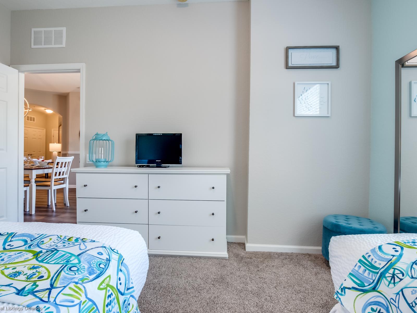 This bedroom offers a  serene escape for a peaceful night's sleep.