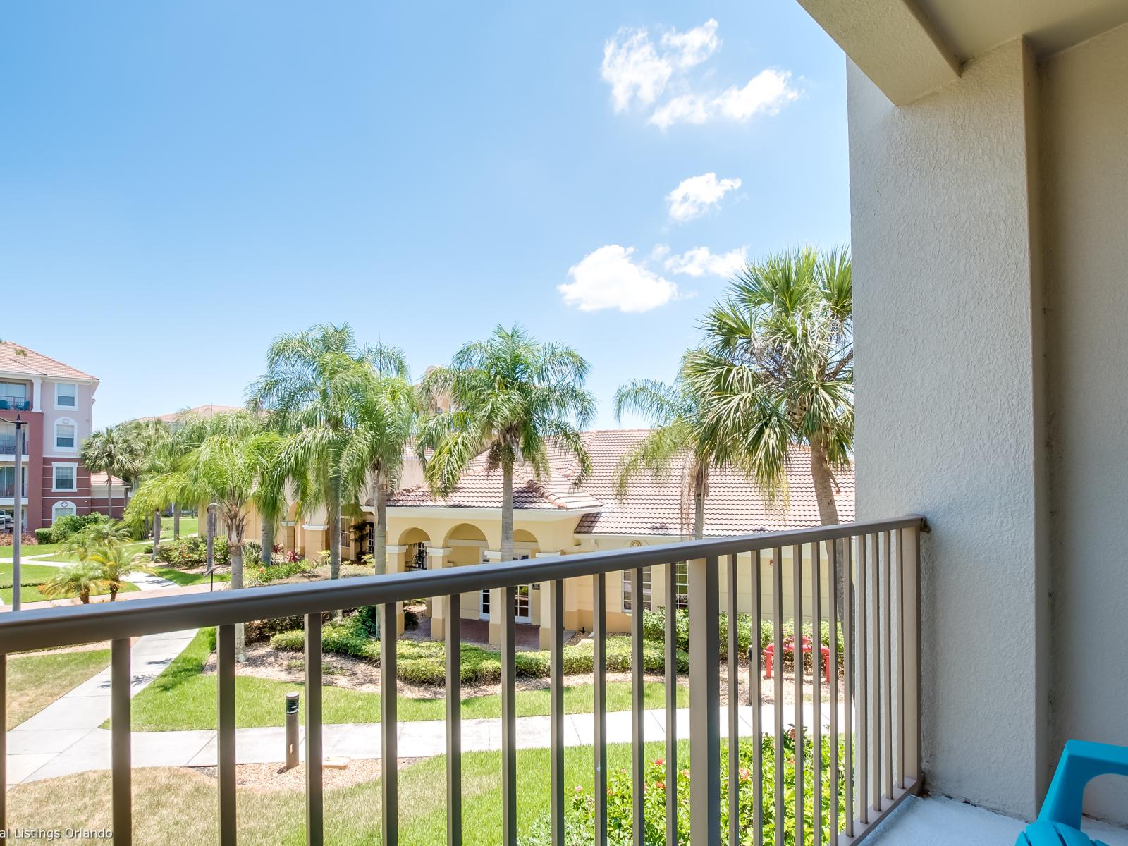 Step out onto this balcony and immerse yourself in the vibrant atmosphere of Vista Cay Resort.