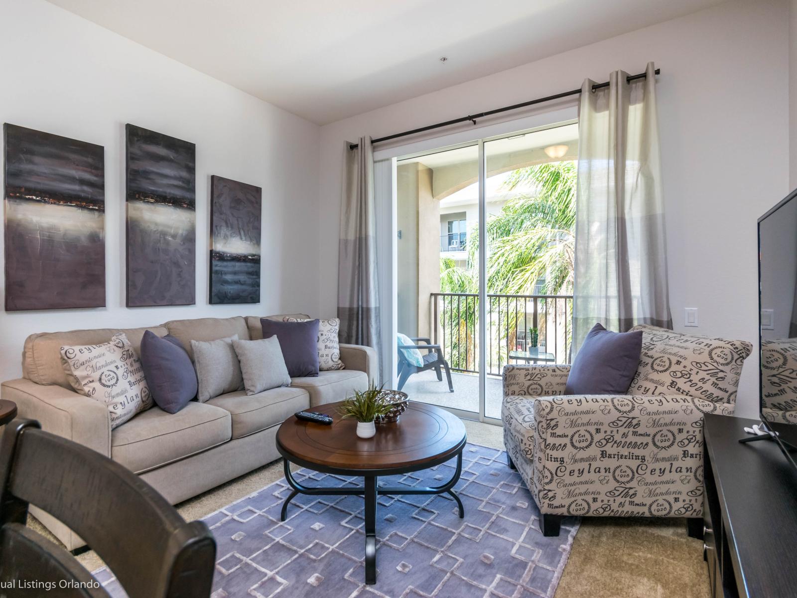 Captivating living area of the condo in Orlando Florida - Stylish furniture arrangement providing comfort and a cohesive look - Smart TV to watch your favorite show - Cozy seating area conducive to relaxation and socializing