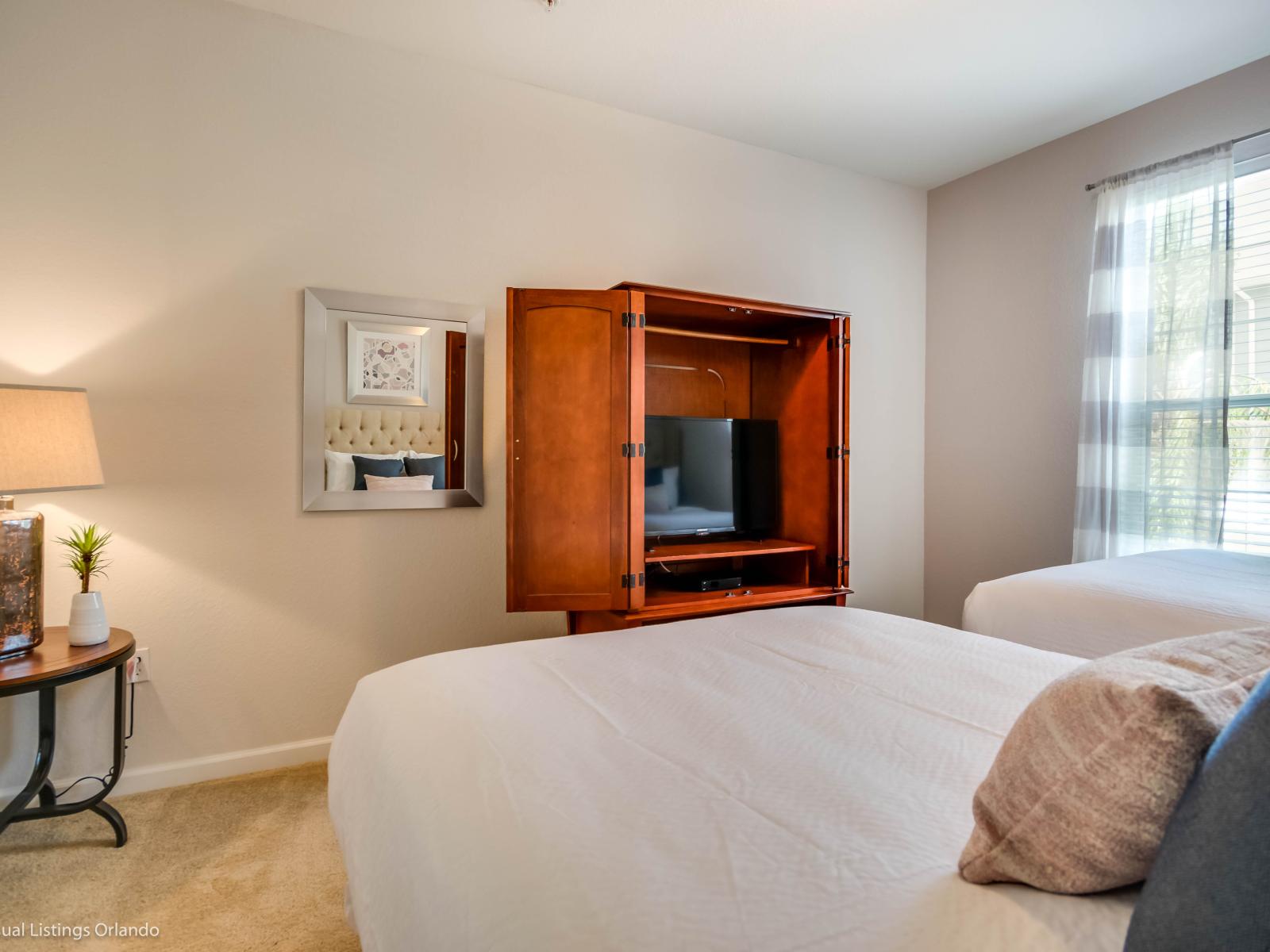 Calming bedroom of the condo in Orlando Florida - Intimate space with a touch of sophistication - Inviting bedroom with a soothing color palette for a tranquil feel