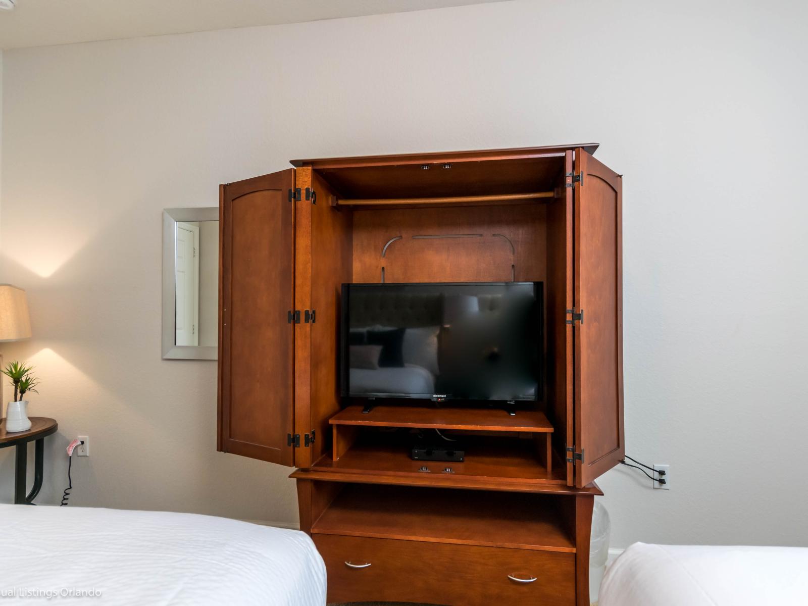 Chic bedroom of the condo in Orlando Florida - Harmonious color palette creating a soothing atmosphere - Inviting atmosphere designed for a restorative sleep - Endless entertainment with smart TV