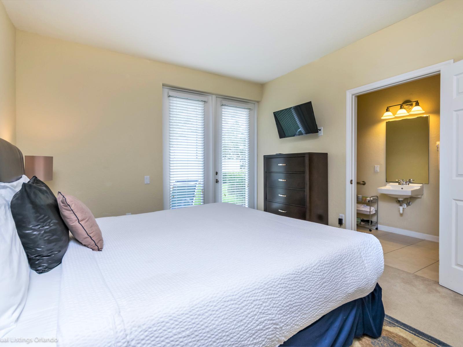 Connected Comfort: Step into our bedroom, equipped with a Smart TV and ensuite bathroom, offering a seamless blend of modern convenience and relaxation