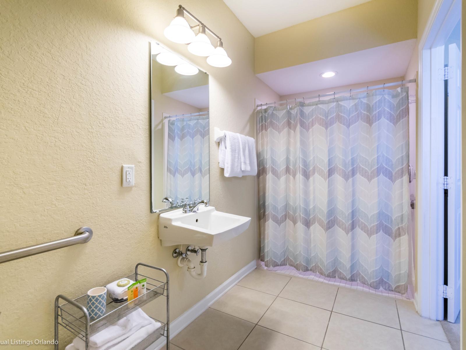 Shower in Style: Our Airbnb bathroom features a walk-in shower, providing a chic and comfortable space for a revitalizing experience