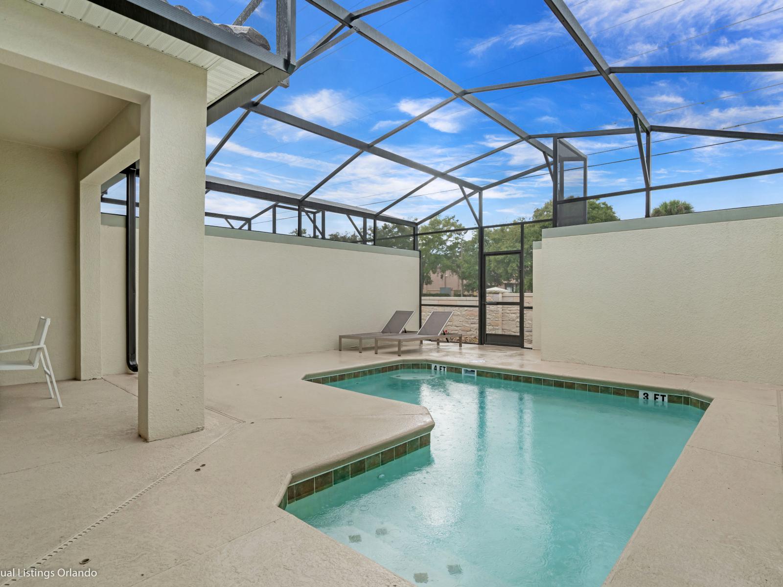 - Stunning Private Pool of the Townhouse in Kissimmee Florida - Inviting pool area for a perfect getaway - Discover bliss by the pool in serene setting - Comfortable lounge chairs for ultimate relaxation