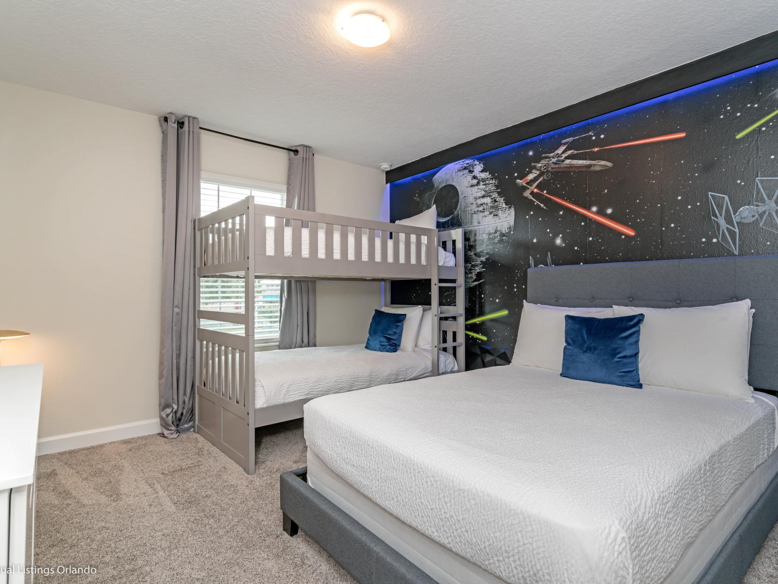 Star Wars Themed Bedroom of the Townhouse in Kissimmee Florida - Offering a Double bed and a bunker bed - Thoughtfully designed interiors for comfort - Bedroom with a cozy ambiance, blending comfort and aesthetics