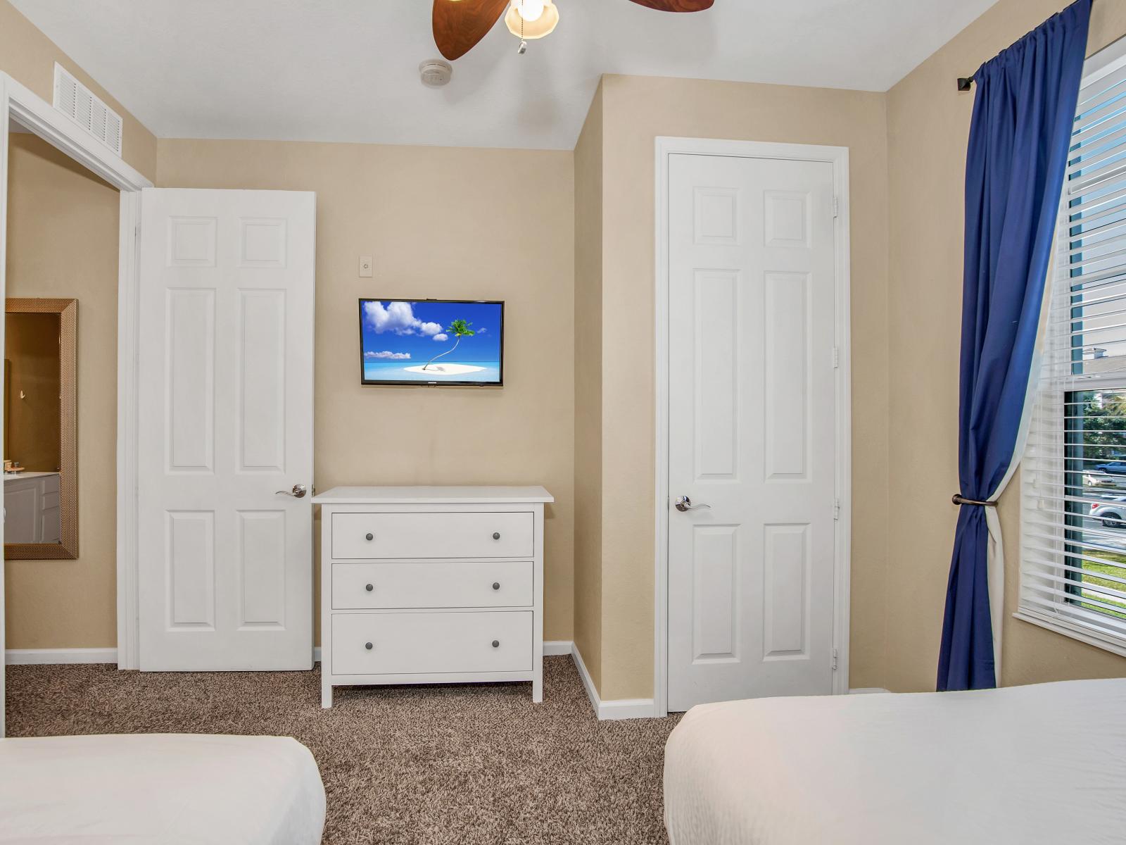 Relaxing bedroom for the condo in Orlando Florida - Featuring two comfy double bed - Thoughtfully designed bedroom featuring functional and stylish furniture - Bedroom with a cozy ambiance, blending comfort and aesthetics