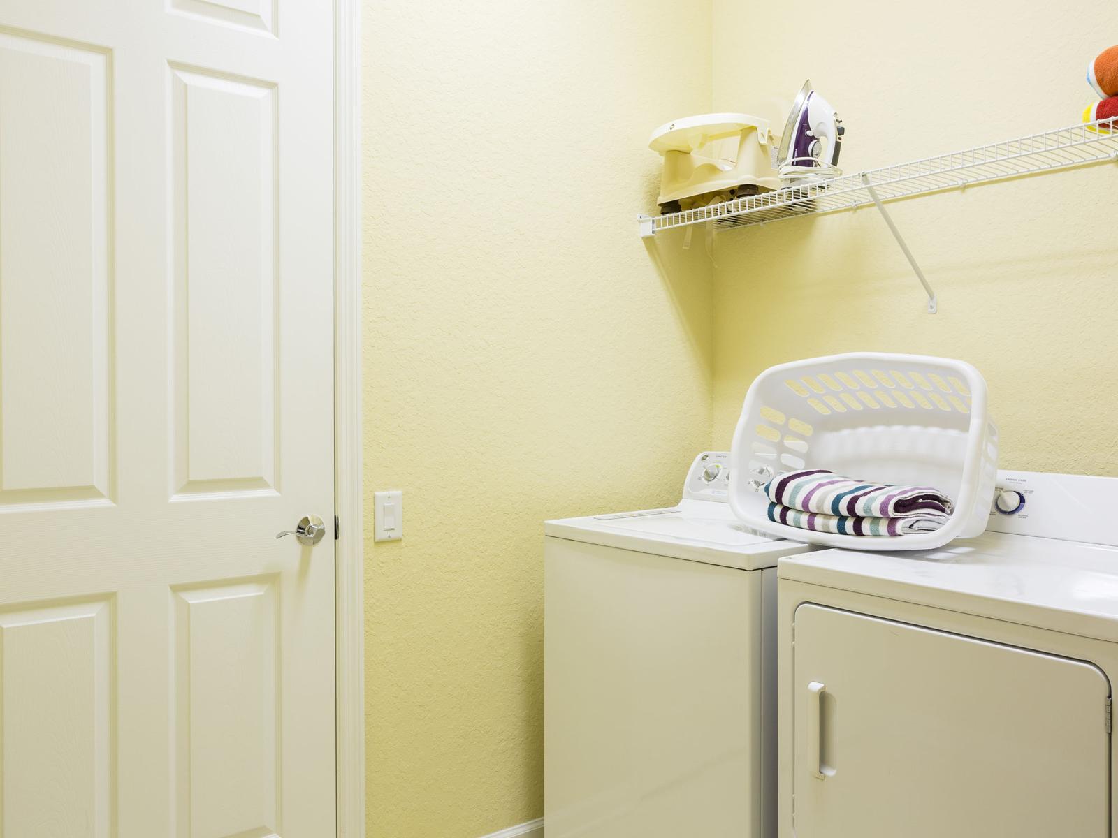 Ensure efficient cleaning with our fully functional laundry area of the condo in Orlando - Keep your clothes and linens fresh throughout your stay with our convenient laundry amenities - Experience peace of mind knowing that  laundry is available