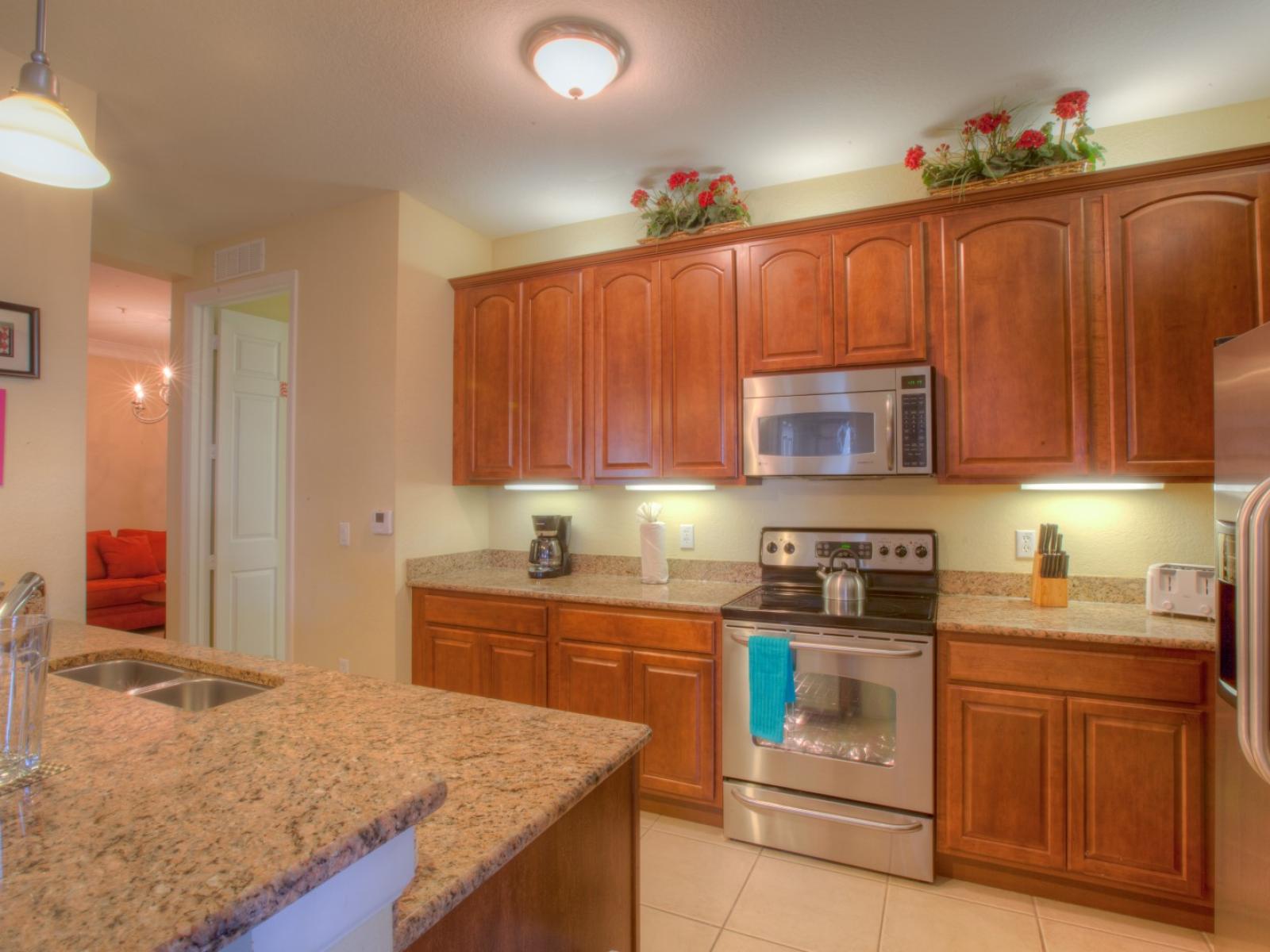 Experience the Pleasure of Cooking in a Fully Equipped Kitchen, Where Every Culinary Need is Met.