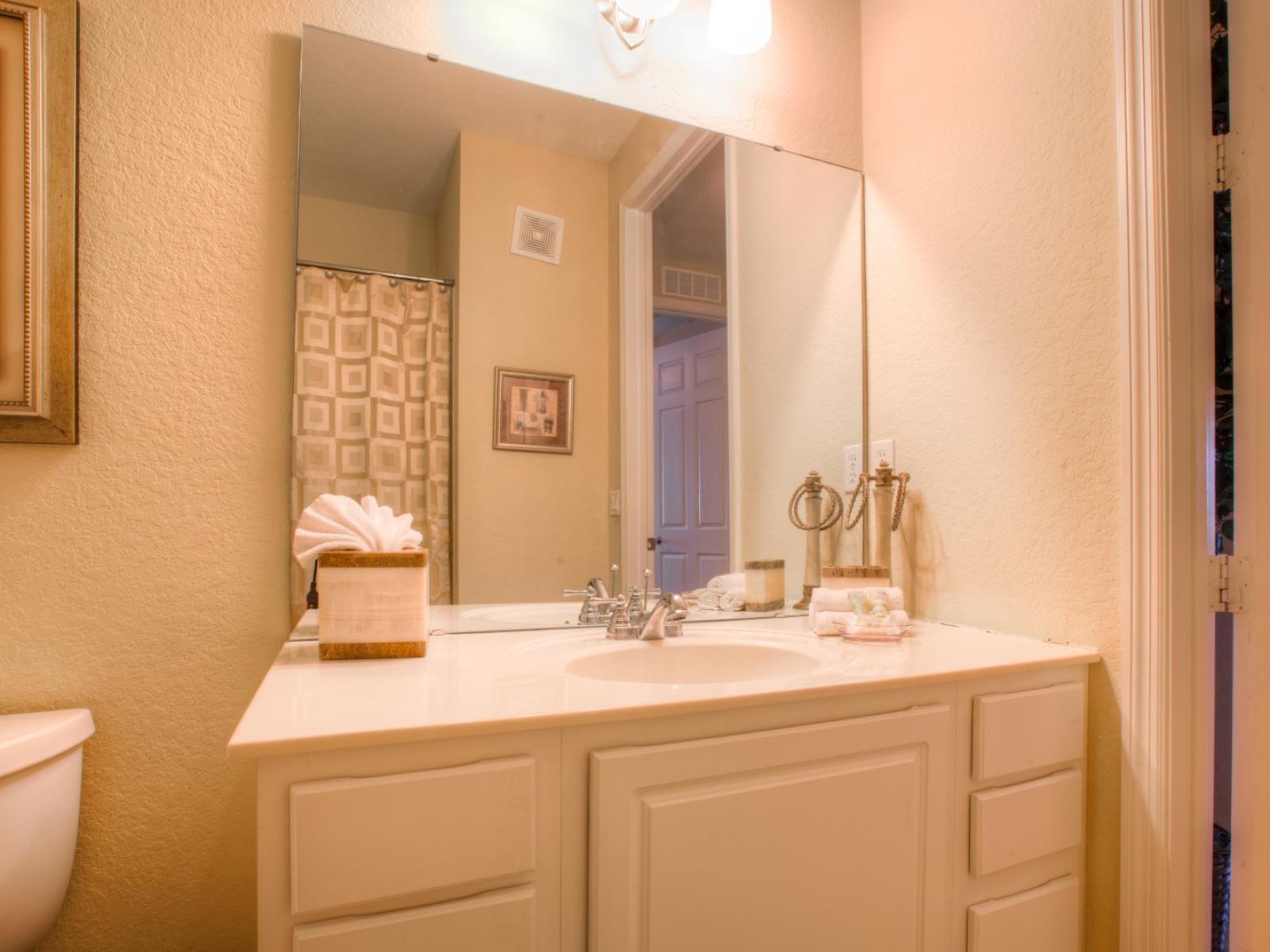 This bathroom  offers contemporary amenities for a rejuvenating experience.