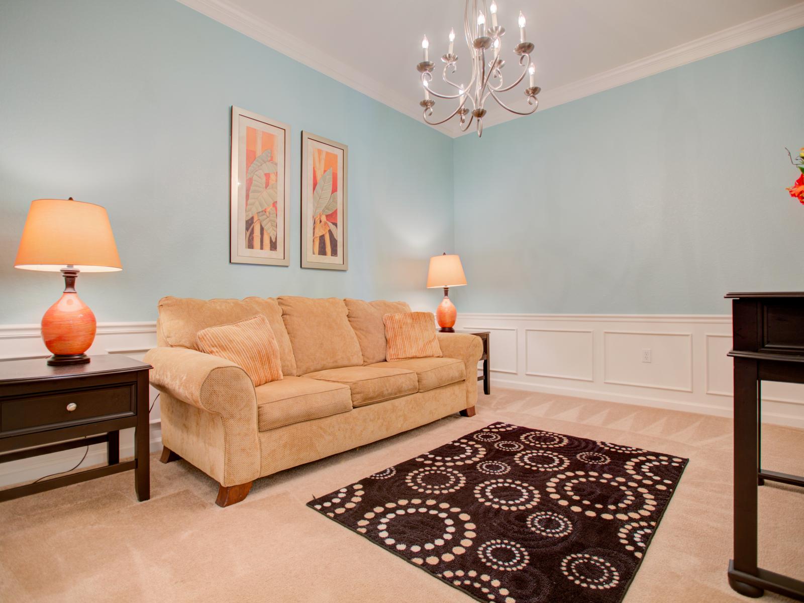 - Spacious living are of the condo in Orlando - Where the expansive sofa are arranged for the moments of relaxation and togetherness. - Majestic chandelier, beautiful table lamps and glamorous wall paintings used for the elite decor