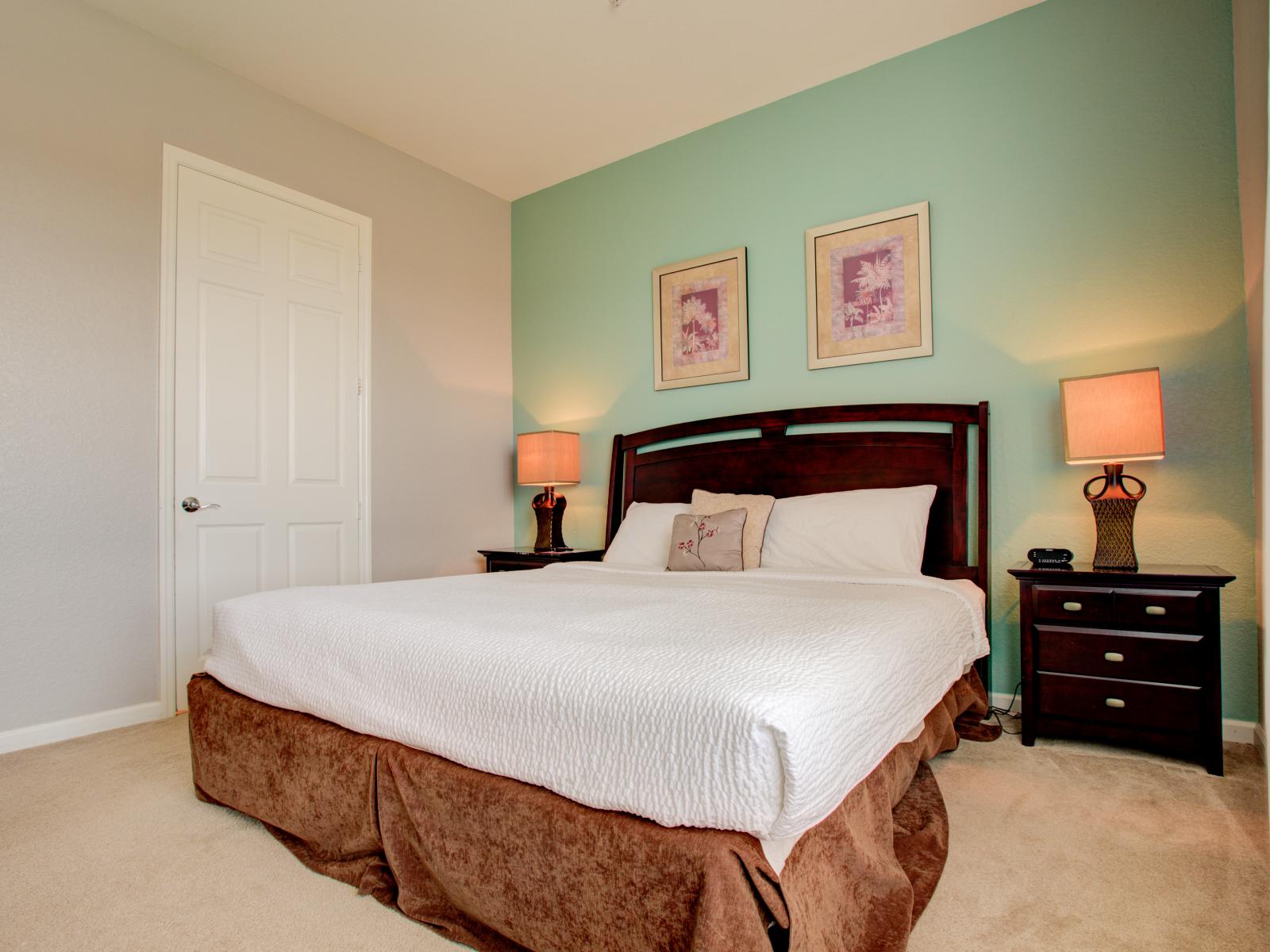 - Embrace the purity of a serene sanctuary in our bedroom of the condo in Orlando - Spacious bedroom offering comfort and style - Plush double bed for restful nights - Bedroom with a cozy ambiance, blending comfort and aesthetics