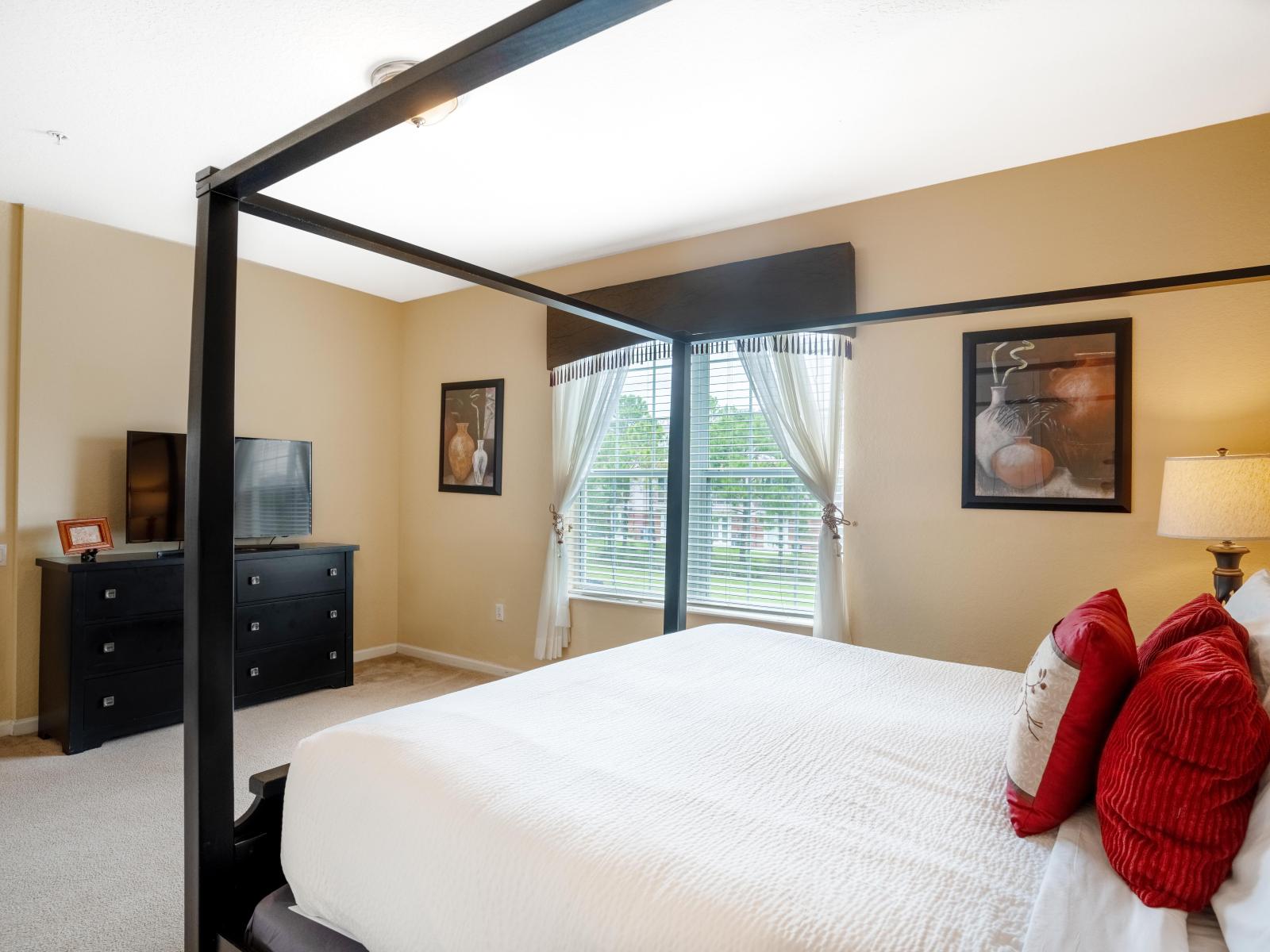 The bedroom has it's a sanctuary of relaxation and entertainment, promising indulgent moments and peaceful nights.