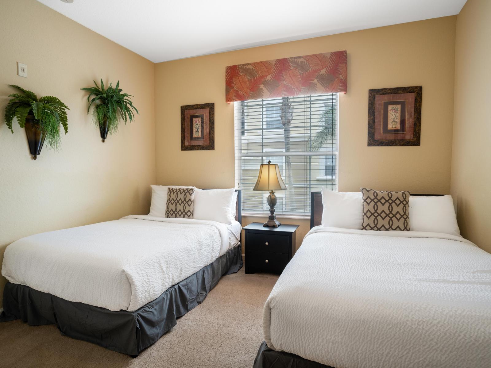 Doubles the Comfort: Our cozy bedroom with two beds offers twice the comfort for a restful night's sleep. Whether for family or friends, this inviting space promises a peaceful retreat after a day of adventure.