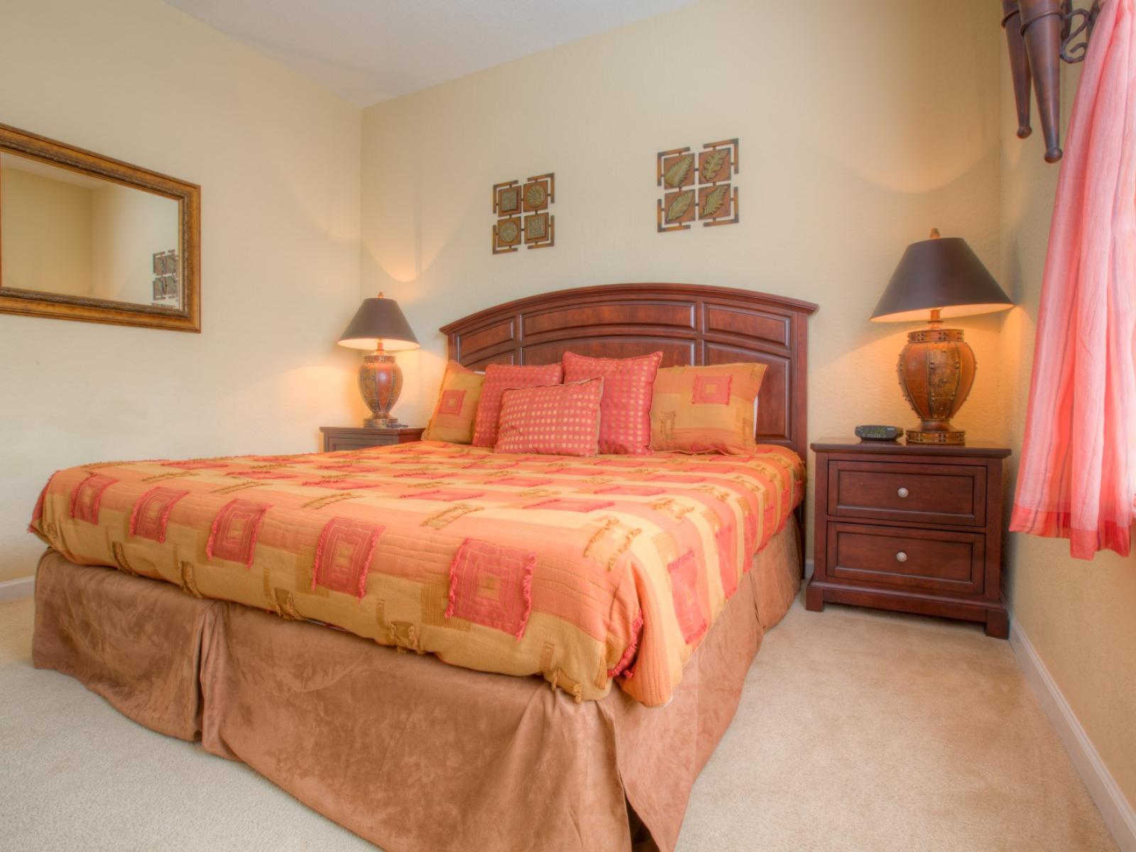 Step into this bedroom at Vista Cay Resort, where natural textures and warm hues evoke a sense of timeless serenity, inviting guests to unwind and embrace the simple elegance of rustic living.