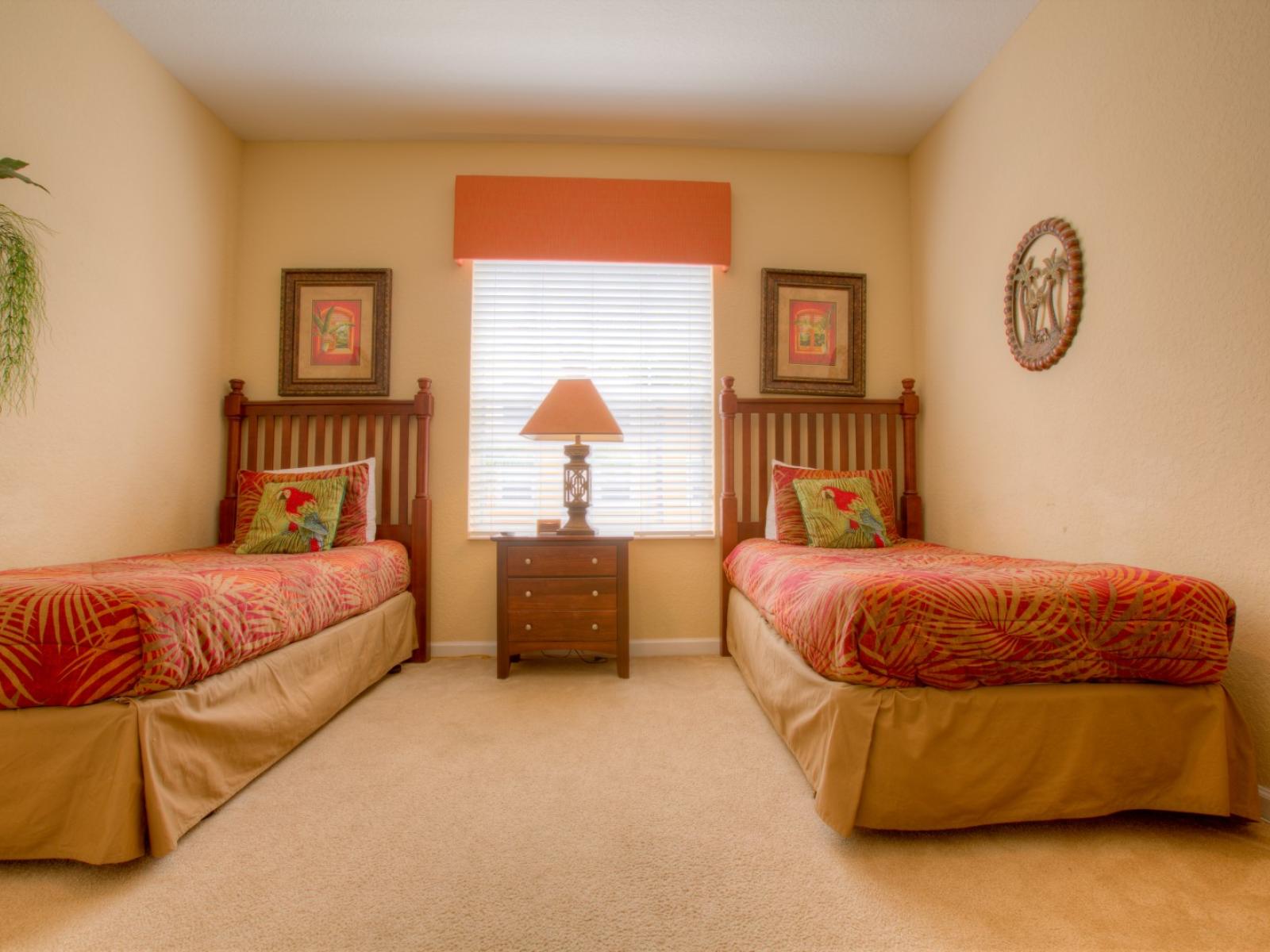 Double the comfort, double the charm: Step into this inviting two-bed bedroom at Vista Cay Resort, where spacious elegance meets cozy relaxation and promising guests a restful retreat.