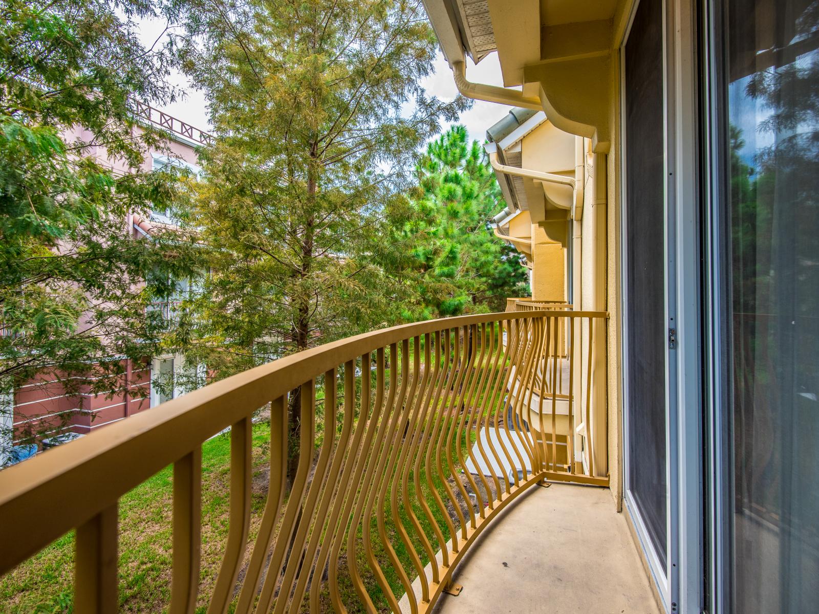 Nature's Embrace: Feel the gentle breeze and soak in the beauty of the surrounding greenery from your personal nature-inspired balcony