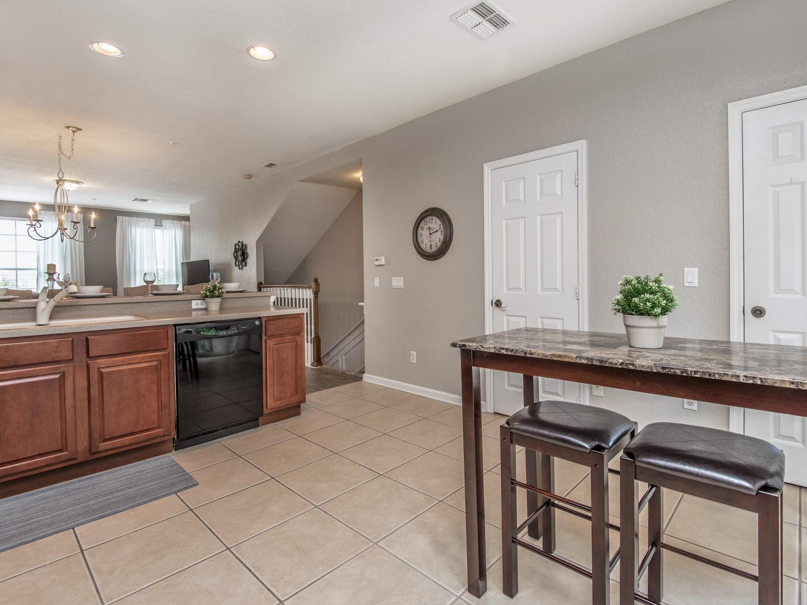 The kitchen is thoughtfully designed with modern appliances and ample counter space, perfect for cooking up culinary delights.