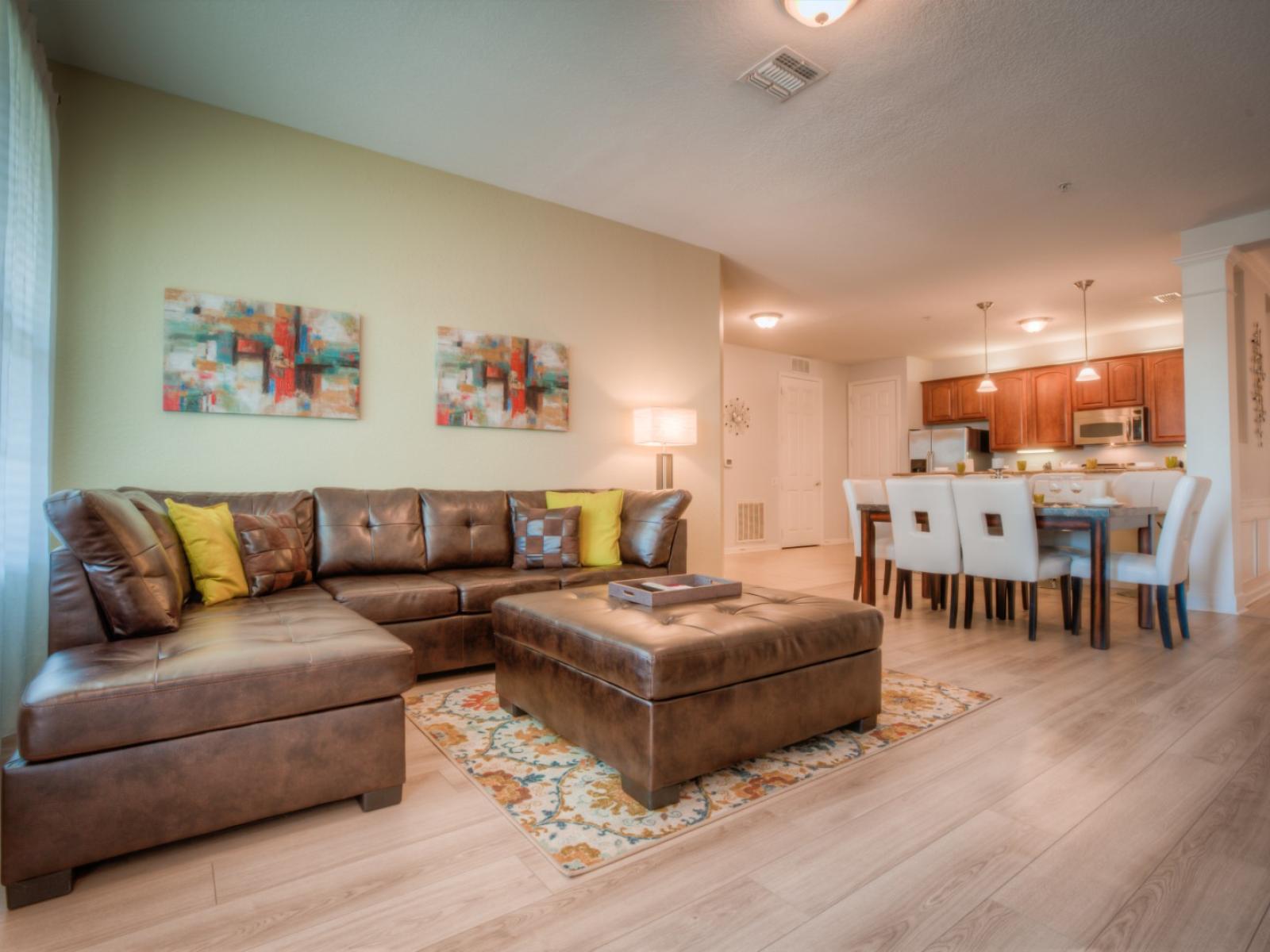 Sublime living area of the condo in Orlando - Experience the modern comfort while relaxing in the spacious living area - Relax and unwind in this inviting space designed for cozy evening with amazing sofa arrangement - Create unforgettable memories