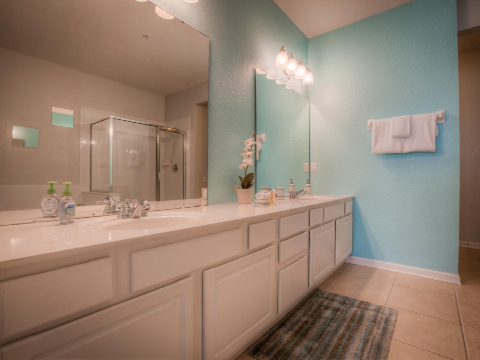 The vanity area at Vista Cay Resort adds a touch of sophistication to your grooming routine, offering a well-lit and stylish space for primping and preparing for your day's adventures.