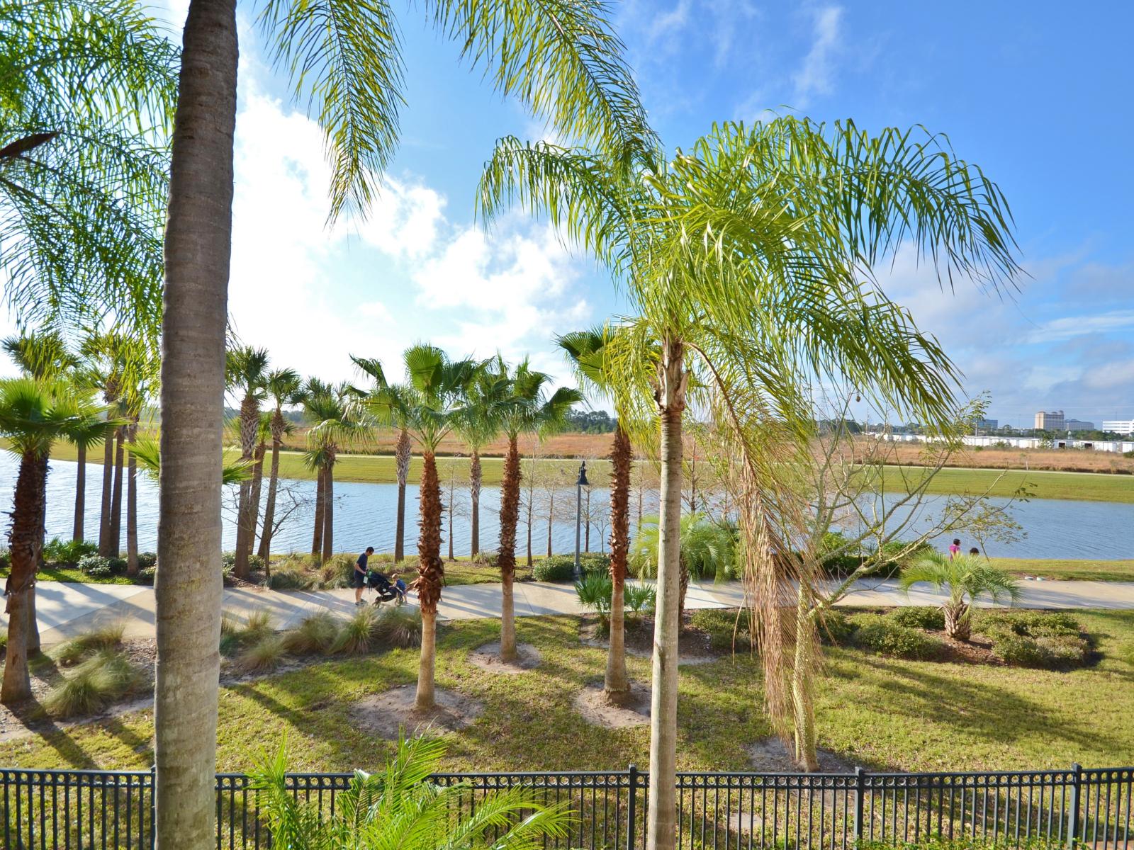 Serenity by the Shores: Behold the picturesque vista of Lake Cay from your balcony at Vista Cay Resort, where tranquil waters and scenic landscapes unite to create a breathtaking backdrop for relaxation and reflection.