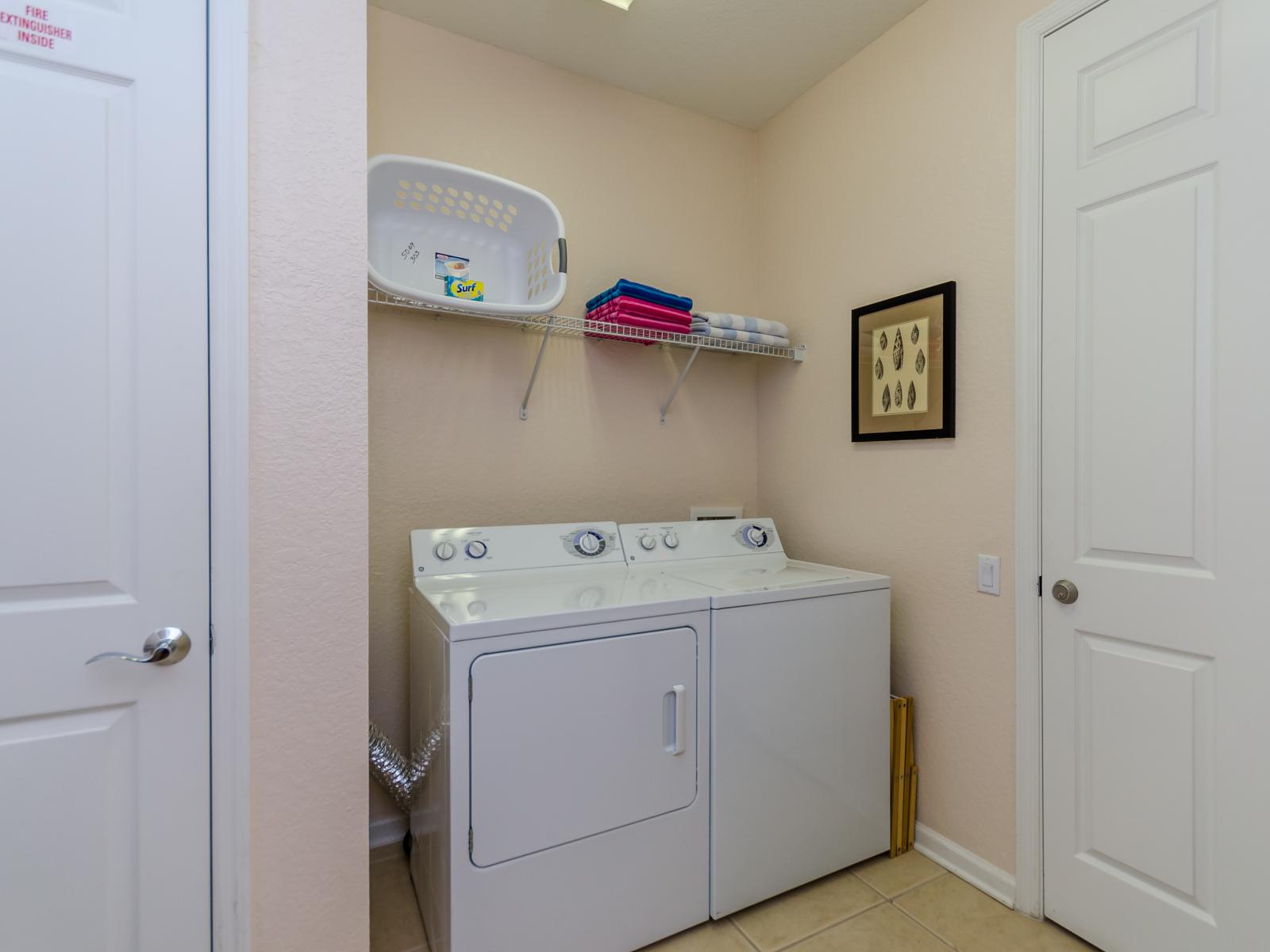 Ensure efficient cleaning with our fully functional laundry area of the condo in Orlando - Allowing you to refresh your wardrobe and linens with ease. - Keep your clothes and linens fresh throughout your stay with our convenient laundry amenities