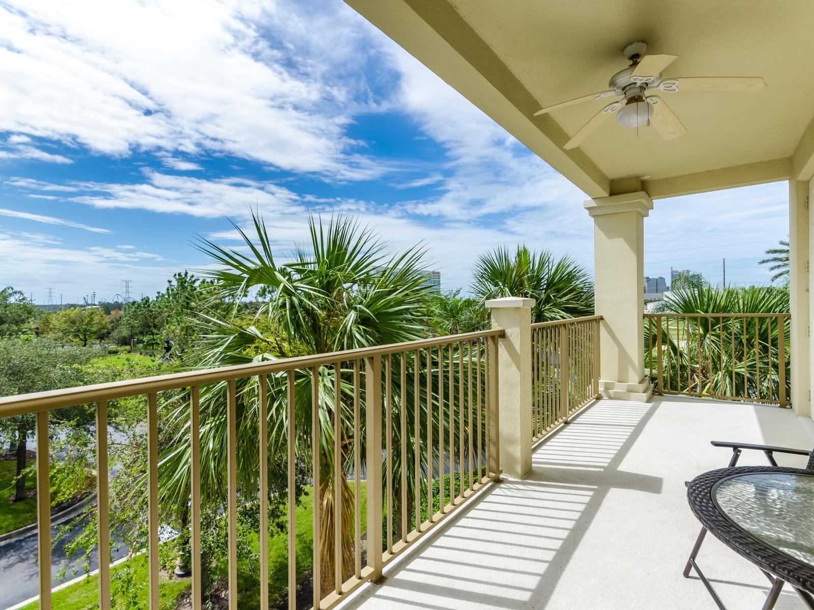 Start your day right with a cup of coffee on the private balcony of the condo in Orlando - Extend your living space outdoors with the private balcony - Enjoy intimate moments with your loved ones in the private balcony with lush surroundings