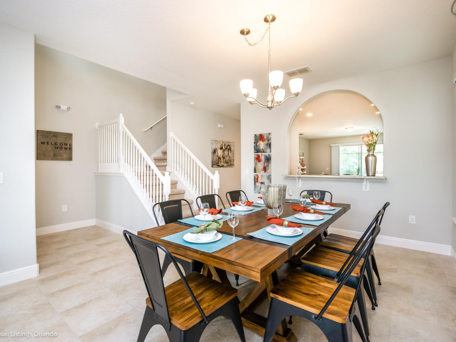 Sleek dining area of the home in Davenport Florida - Every meal becomes a feast for the senses - Amidst the elegance - Stylish dining space with chic furnishings - 8 Seater dining area