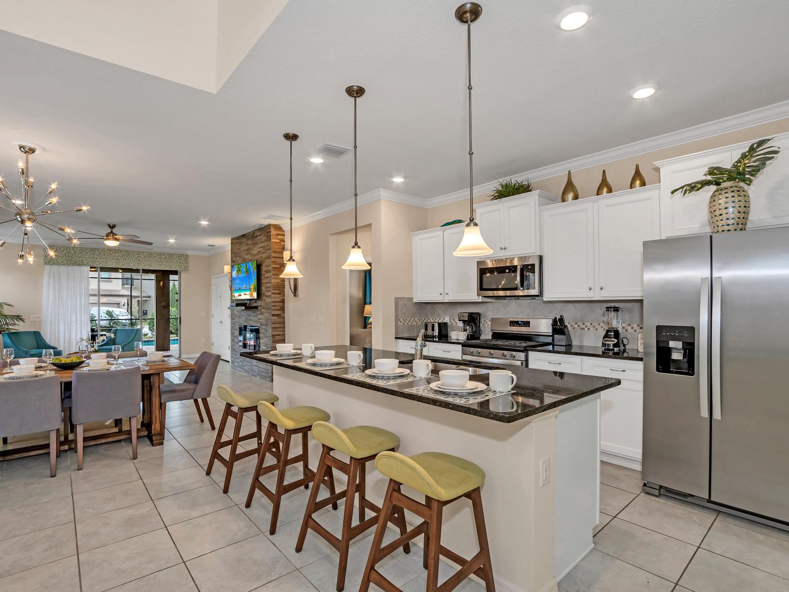 Modern kitchen of the home in Davenport Florida - Contemporary design with clean lines and minimalist aesthetics - Integrated appliances for a seamless and stylish appearance - Thoughtful placement of kitchen essentials for easy access