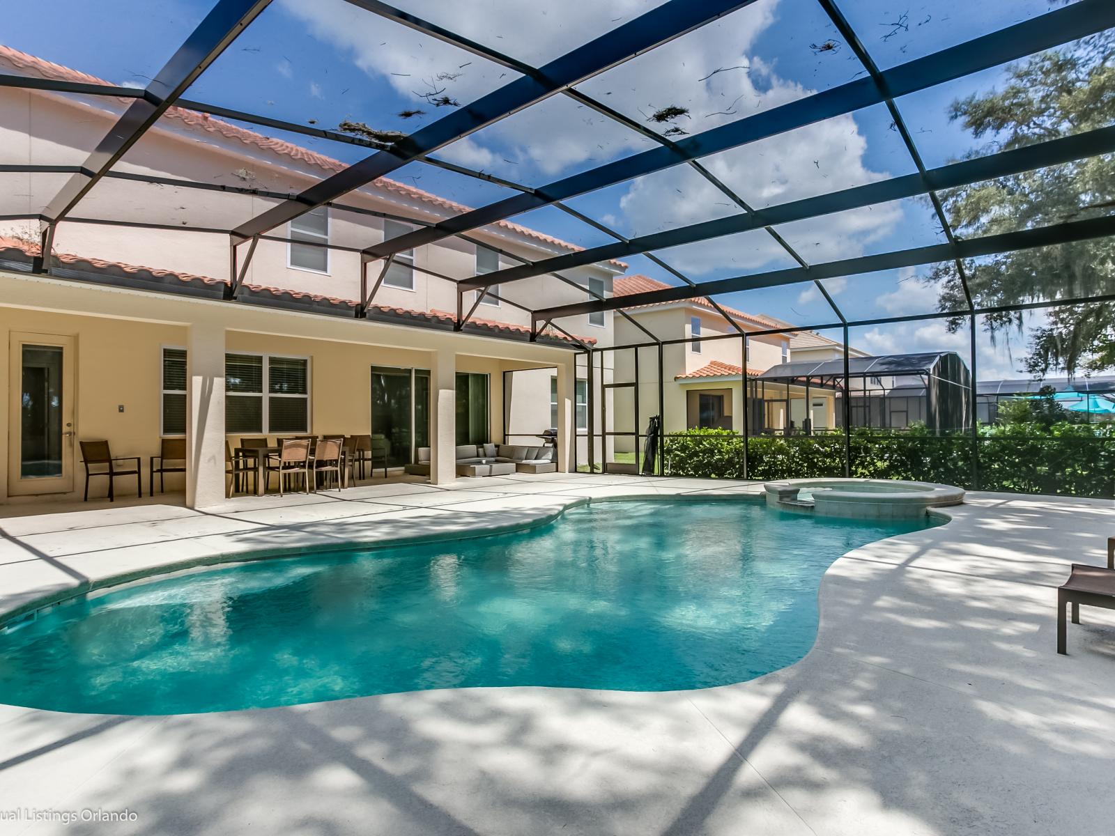 Lavish Private Pool Area of the Villa in Florida - Enjoy leisurely moments in our inviting pool area - Comfortable Beach Chairs - Crystal Clear Water