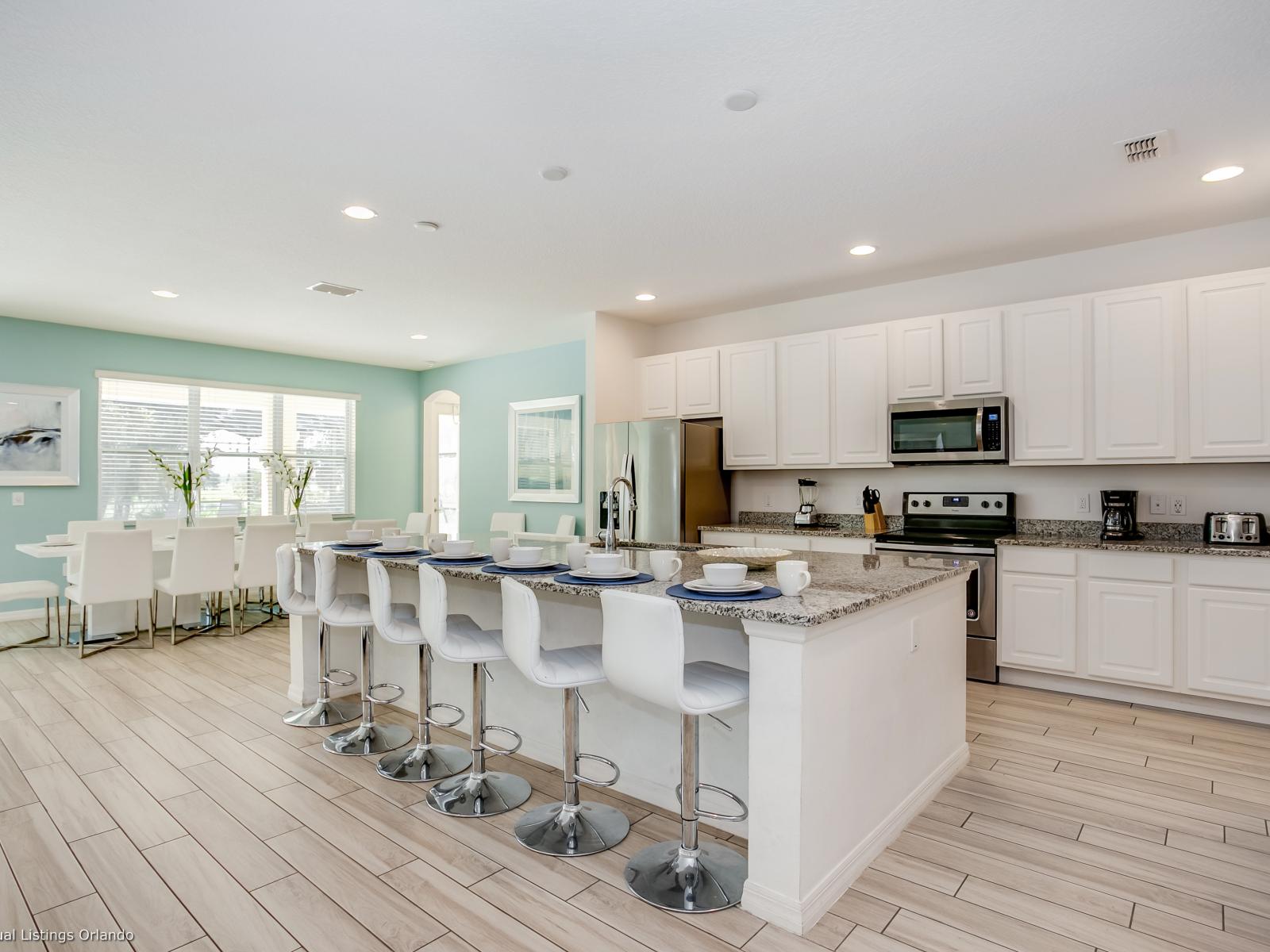 Spacious Kitchen area of Villa in Davenport Florida - Fully equipped with kitchen Accessories - Plenty amount of storage - Prepare a tempting, home-cooked meals for your loved ones.