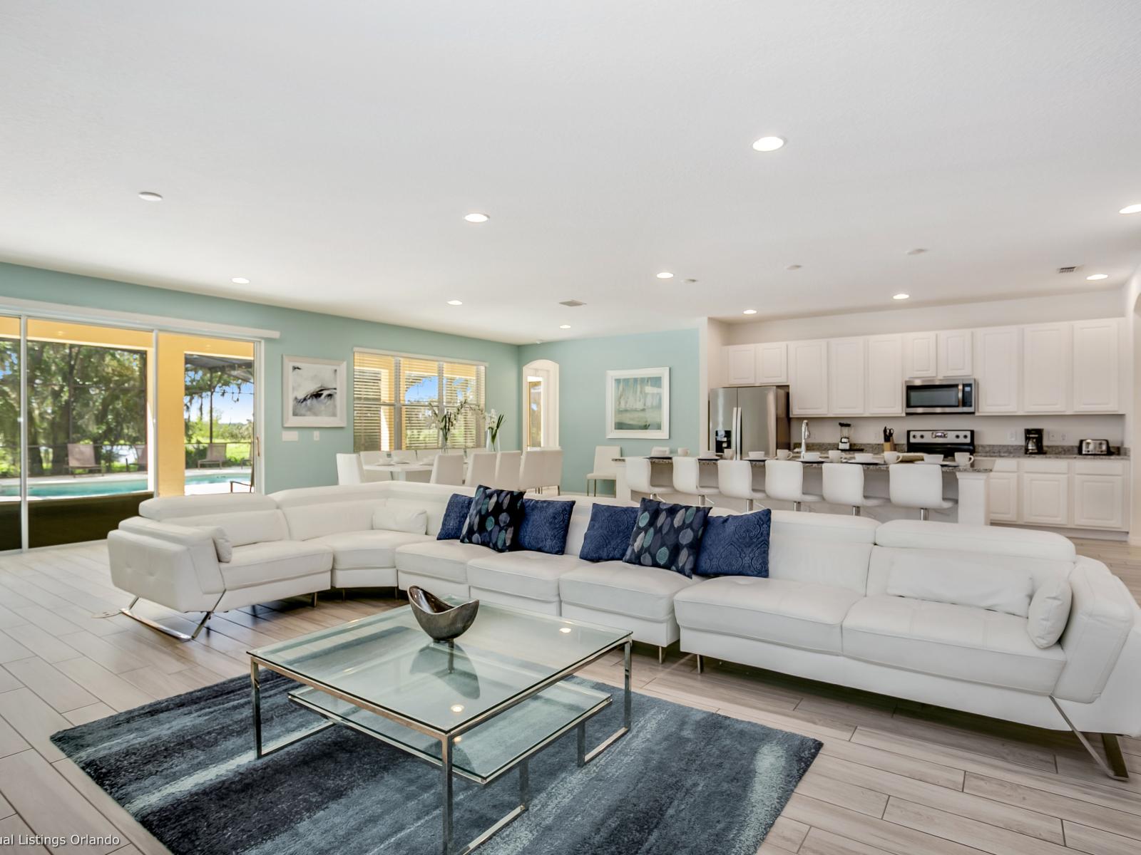 Spacious living Area of the Villa in Florida - Open and very spacious main living space, connecting the living , dining and kitchen - Cozy seating area conducive to relaxation and socializing - Elegant Decor, adding sophistication