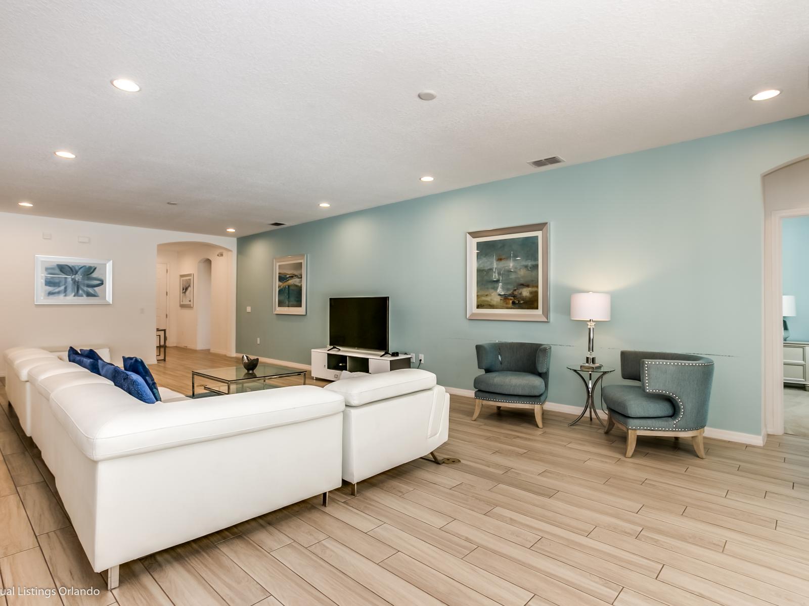 Elegant Living Area of the Villa in Florida - Smart TV and Netflix - Comfy Sofa - Harmonious color scheme with pops of accent colors for visual interest