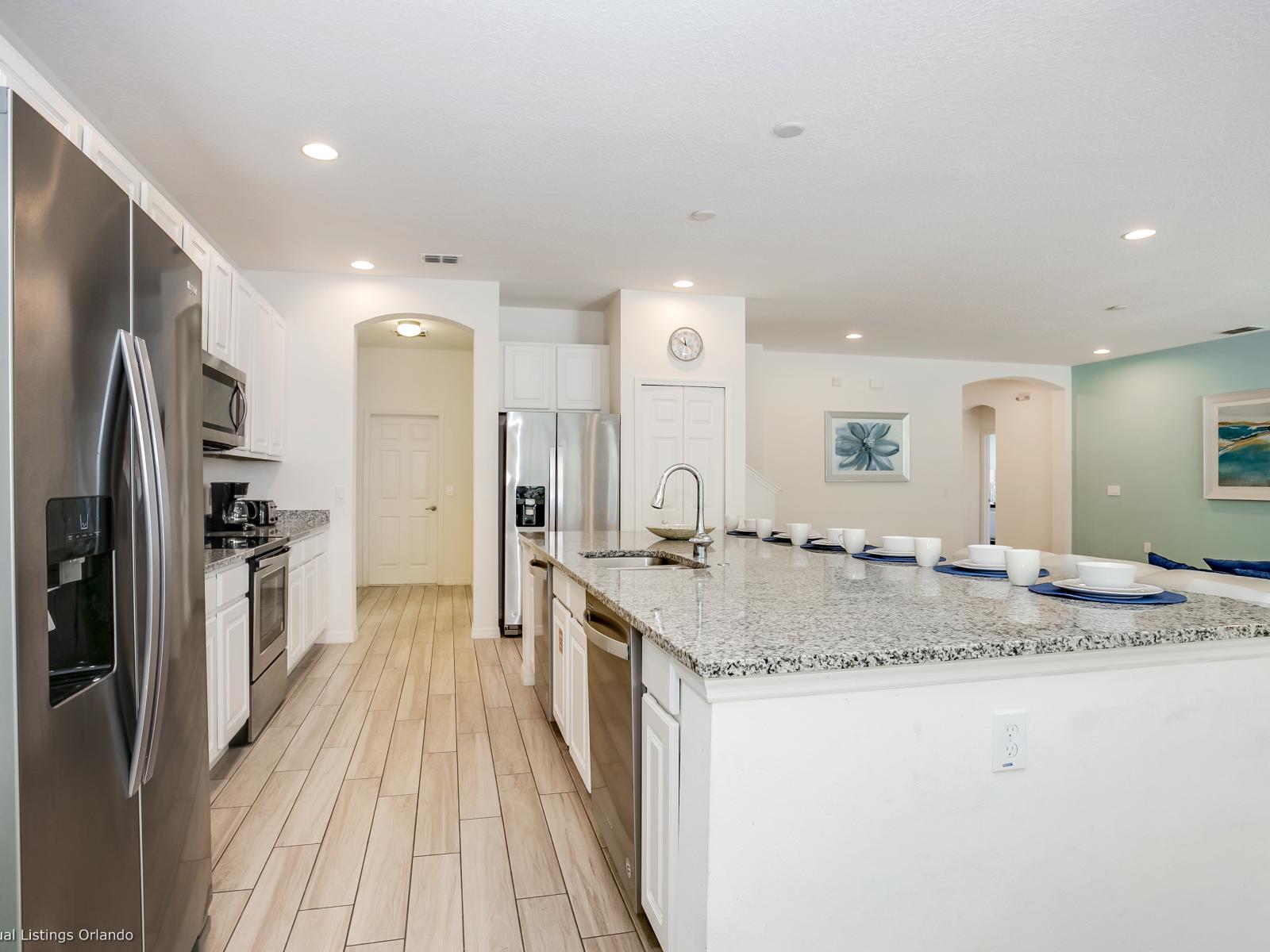 Modern Kitchen of the Villa in Florida  - With all the appliances needed to make a delicious home made meal - Functional breakfast bar for additional workspace - Thoughtful placement of kitchen essentials for easy access