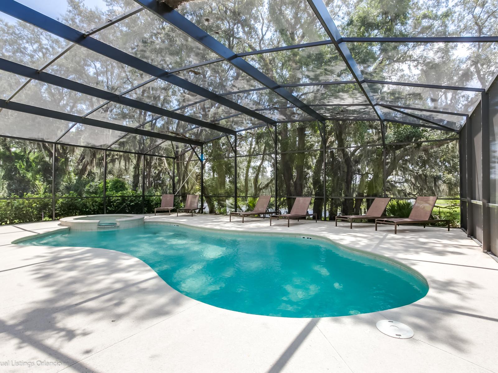 Private Refreshing  Pool Area of the Villa in Florida -  Scenic space for relaxation - Dive into a refreshing poolside escape - Lounge in tranquility by the sparkling waters