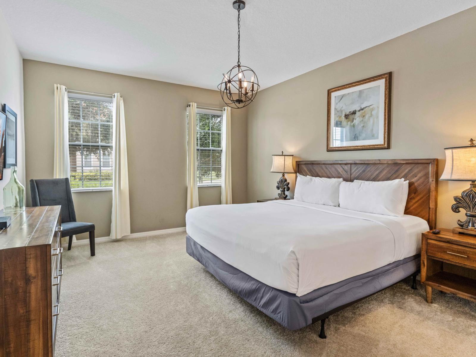 Experience ultimate comfort in Bedroom 2, featuring a luxurious king-size bed and private ensuite.