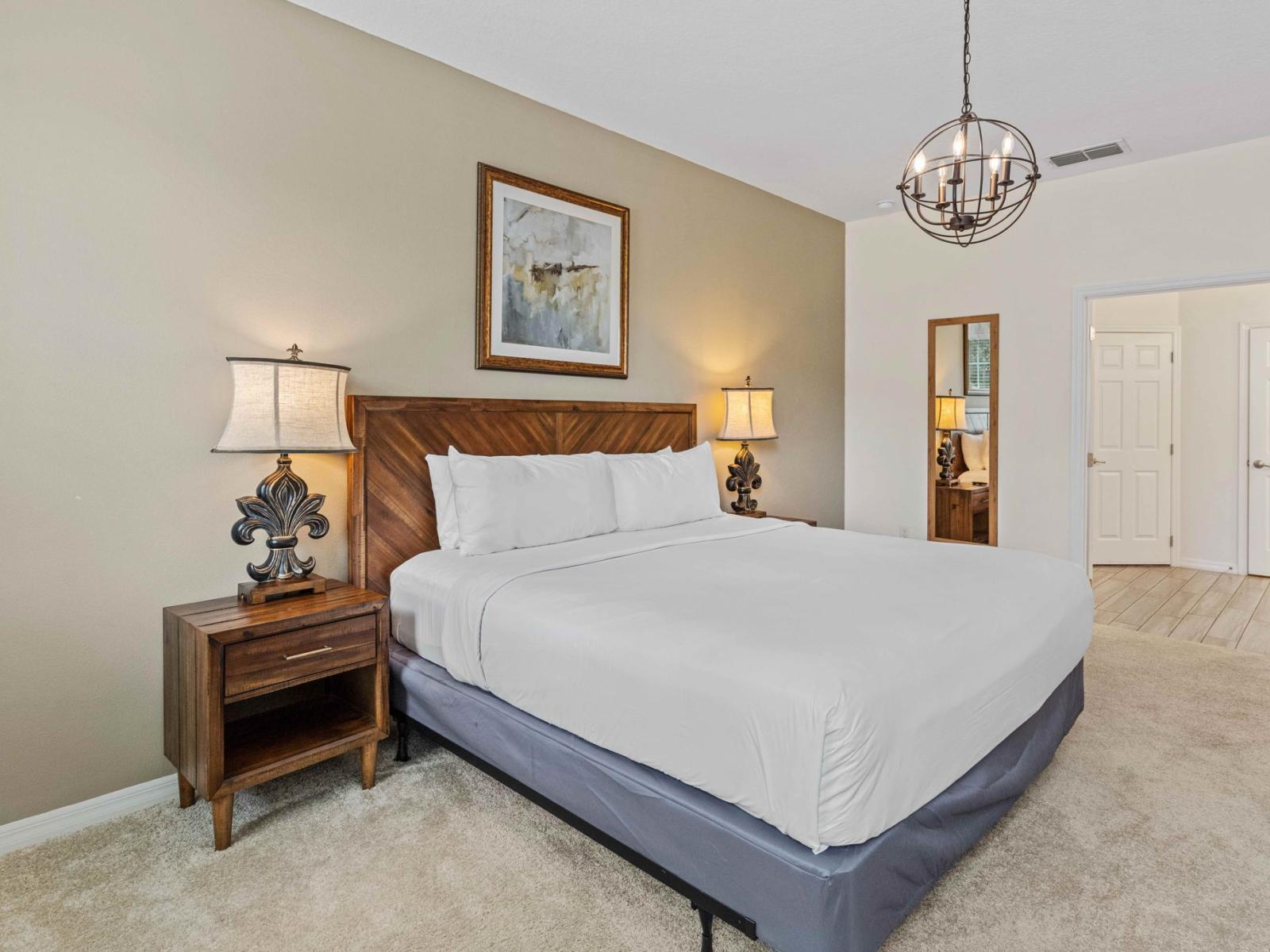 Your private retreat awaits – unwind in this spacious bedroom with a king-size bed and ensuite.