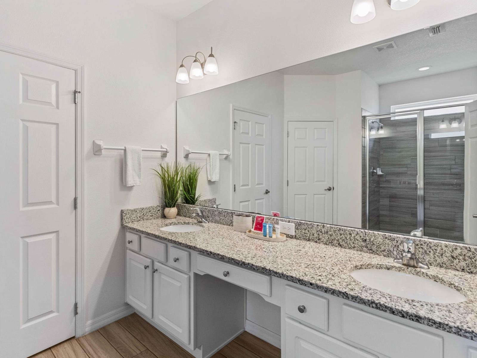 Step into elegance – Bathroom 2 features a sleek walk-in shower for a spa-like experience.