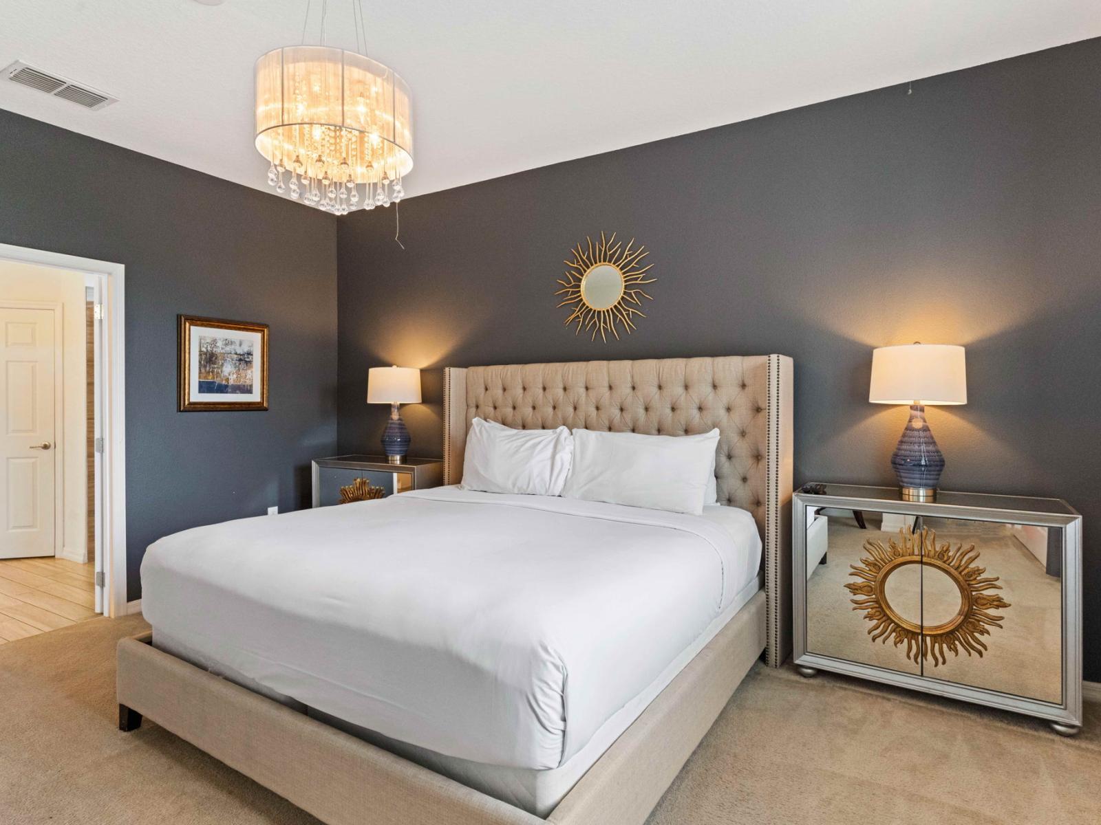 Retreat to comfort and luxury in Bedroom 3, complete with a king-size bed and private ensuite.