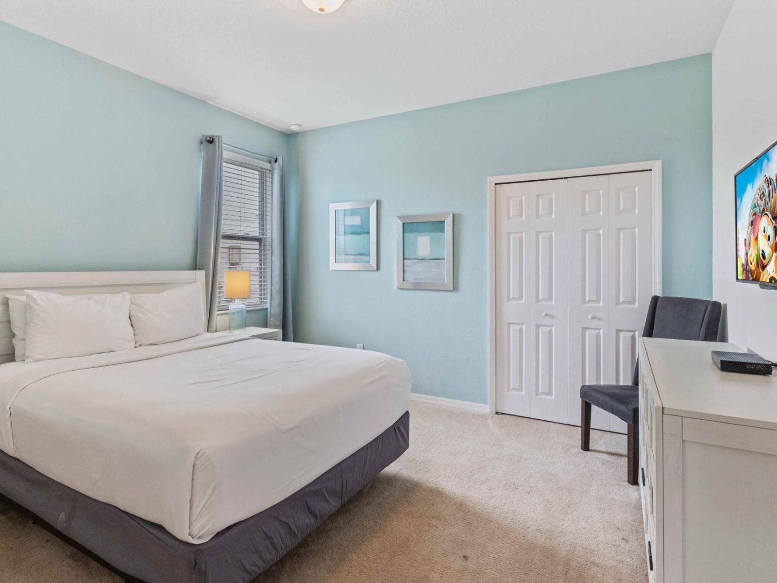 A perfect blend of comfort and charm – unwind in this lovely queen-size bedroom.