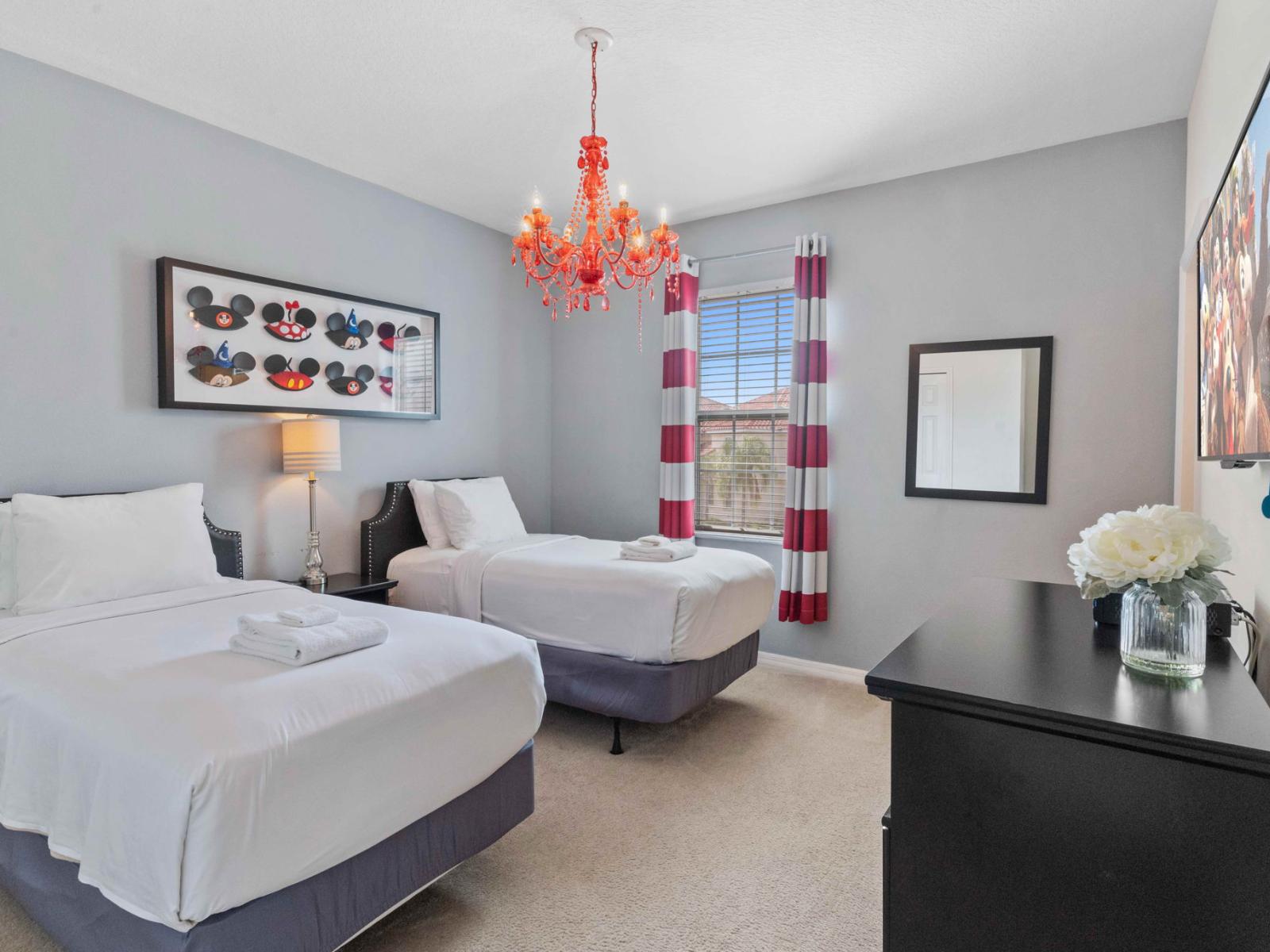 Ideal for friends or family – Bedroom 6 features two cozy twin beds and a private ensuite.