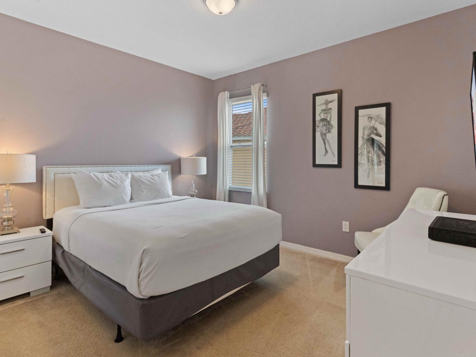 A cozy sanctuary awaits – Bedroom 8 features a comfortable queen-size bed for a restful night.