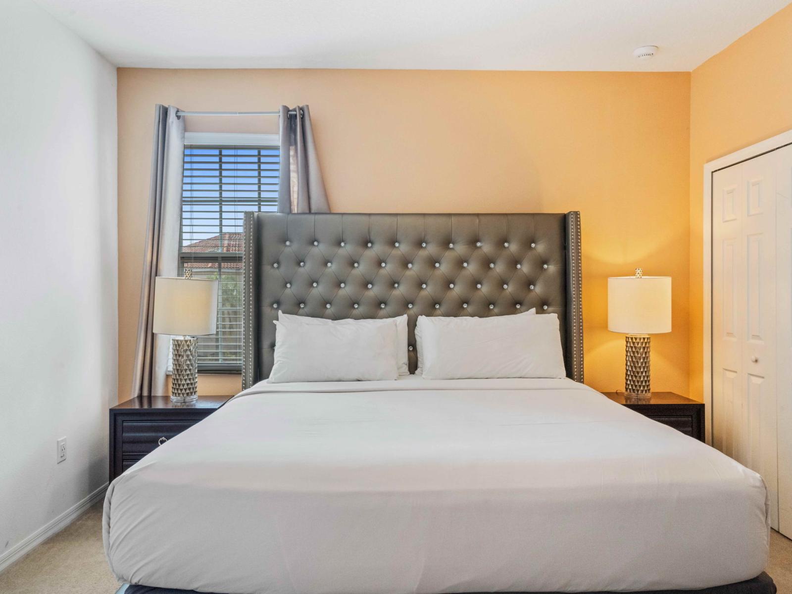 Retreat to comfort and luxury in Bedroom 10, complete with a king-size bed and private ensuite.