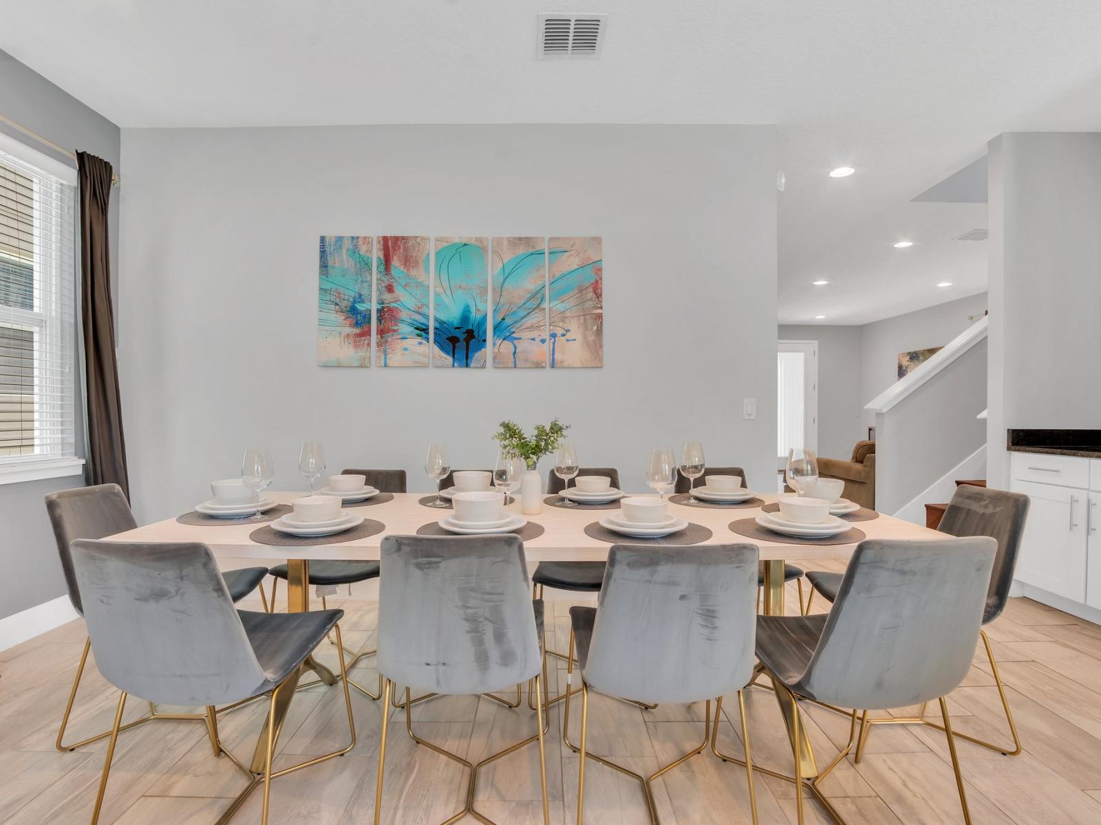 Palatine Dinging Area of the Apartment in Kissimmee Florida - 10 Persons Dining - Artfully arranged table settings for a touch of elegance - Mix of textures, such as velvet dining chairs and a polished table