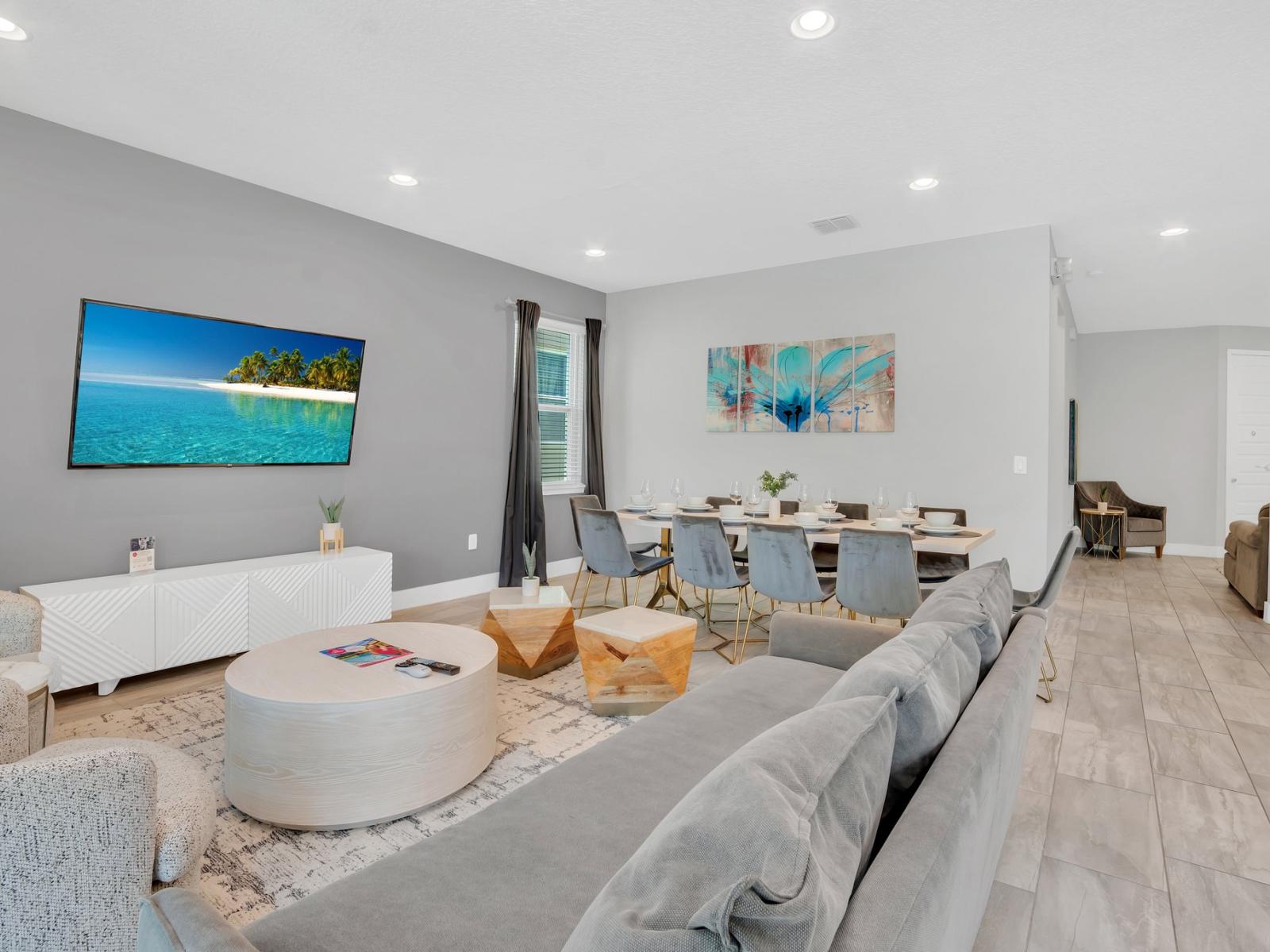 Grand Living Area of the Apartment in Kissimmee Florida - Stylish furniture arrangement providing comfort and a cohesive look - Thoughtful mix of textures, from plush rugs to tasteful throw pillows - Smart TV and Netflix