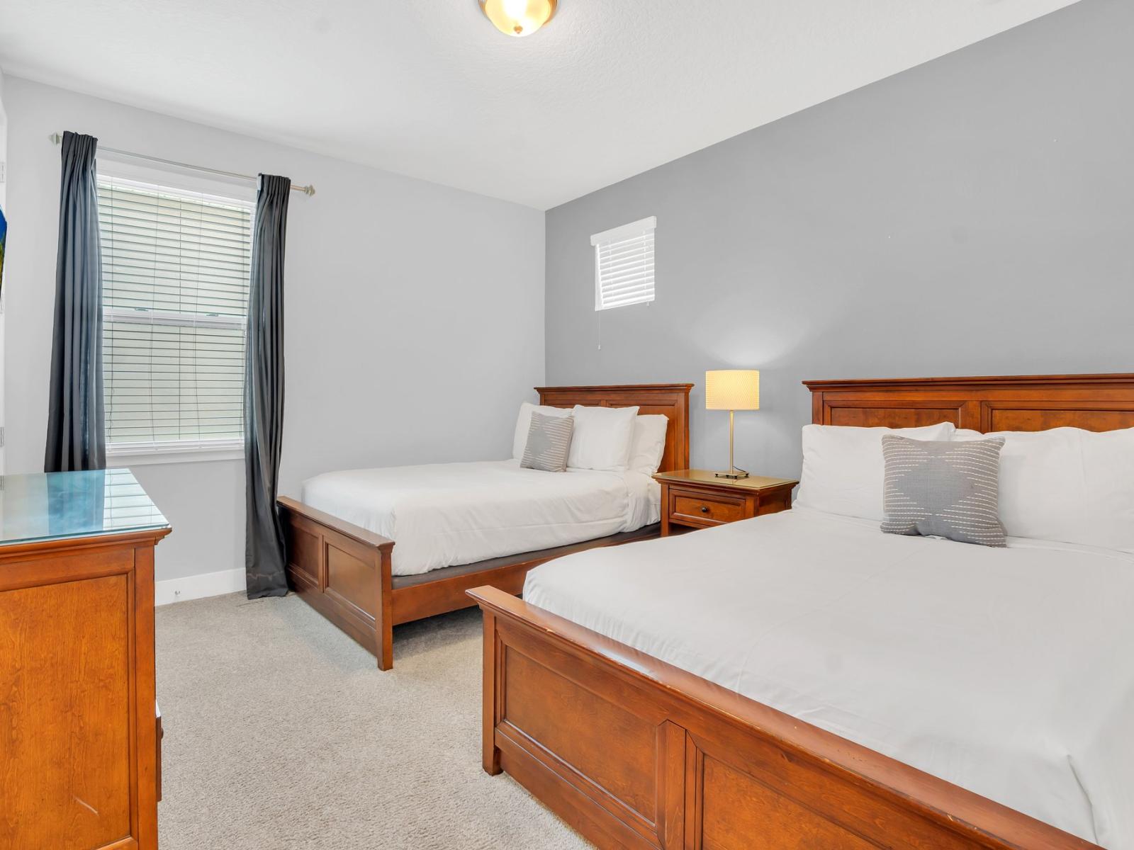 Lofty Bedroom of the Apartment in Kissimmee Florida - Large size comfy twin Bed - Bright and airy bedroom with large windows for natural illumination - Smart TV and Netflix -Minimalist decor, creating a clean and uncluttered sleeping space