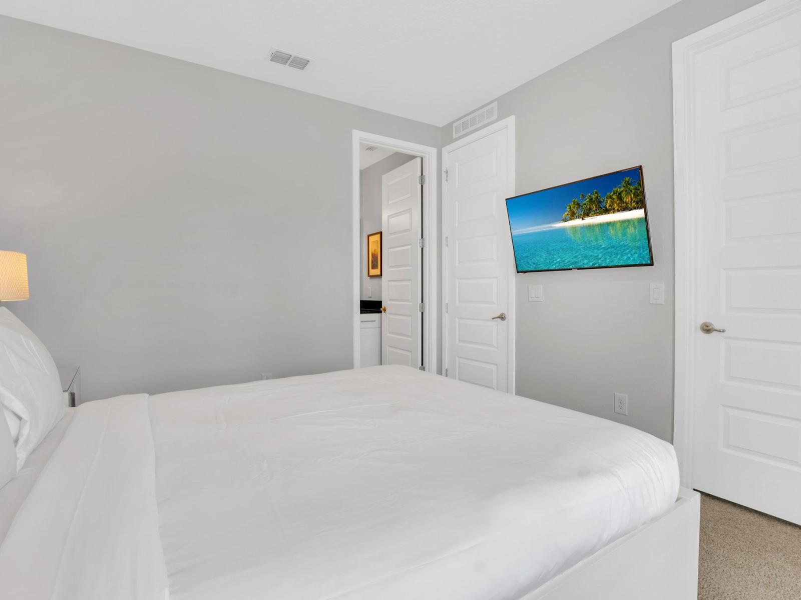 Cozy Oasis: Unwind in the comfort of our inviting bedroom – a perfect sanctuary for a restful stay.