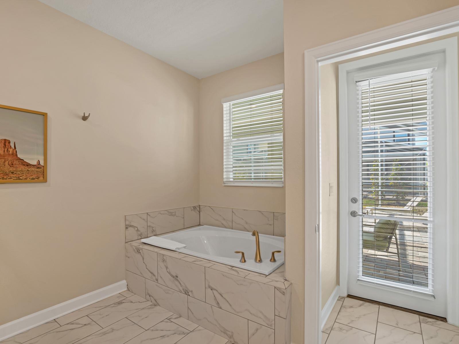 Take full advantage of your deluxe ensuite, complete with a double wide vanity, glass stall shower, soaker tub, and private entrance to your outdoor veranda.