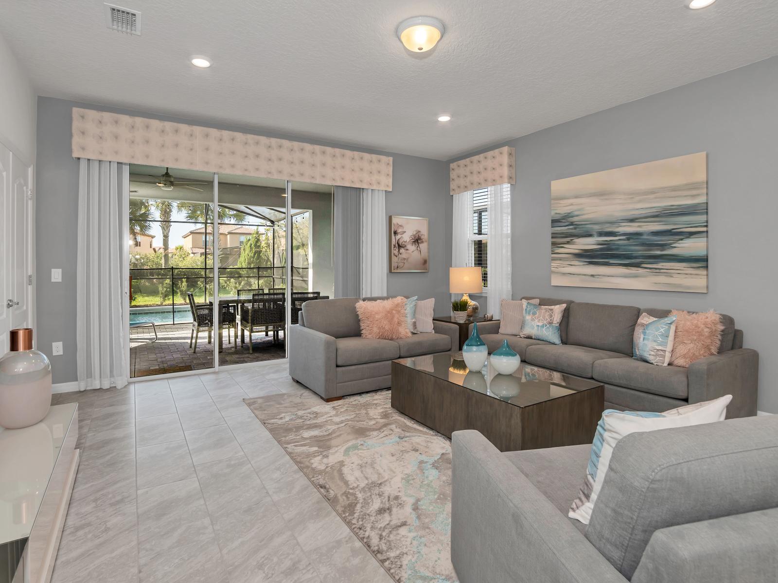 Lush Living Area of the Apartment in Davenport Florida - Cozy and Comfy Sofa - Plants for a refreshing and lively ambiance - Smart TV and Netflix - Large Window