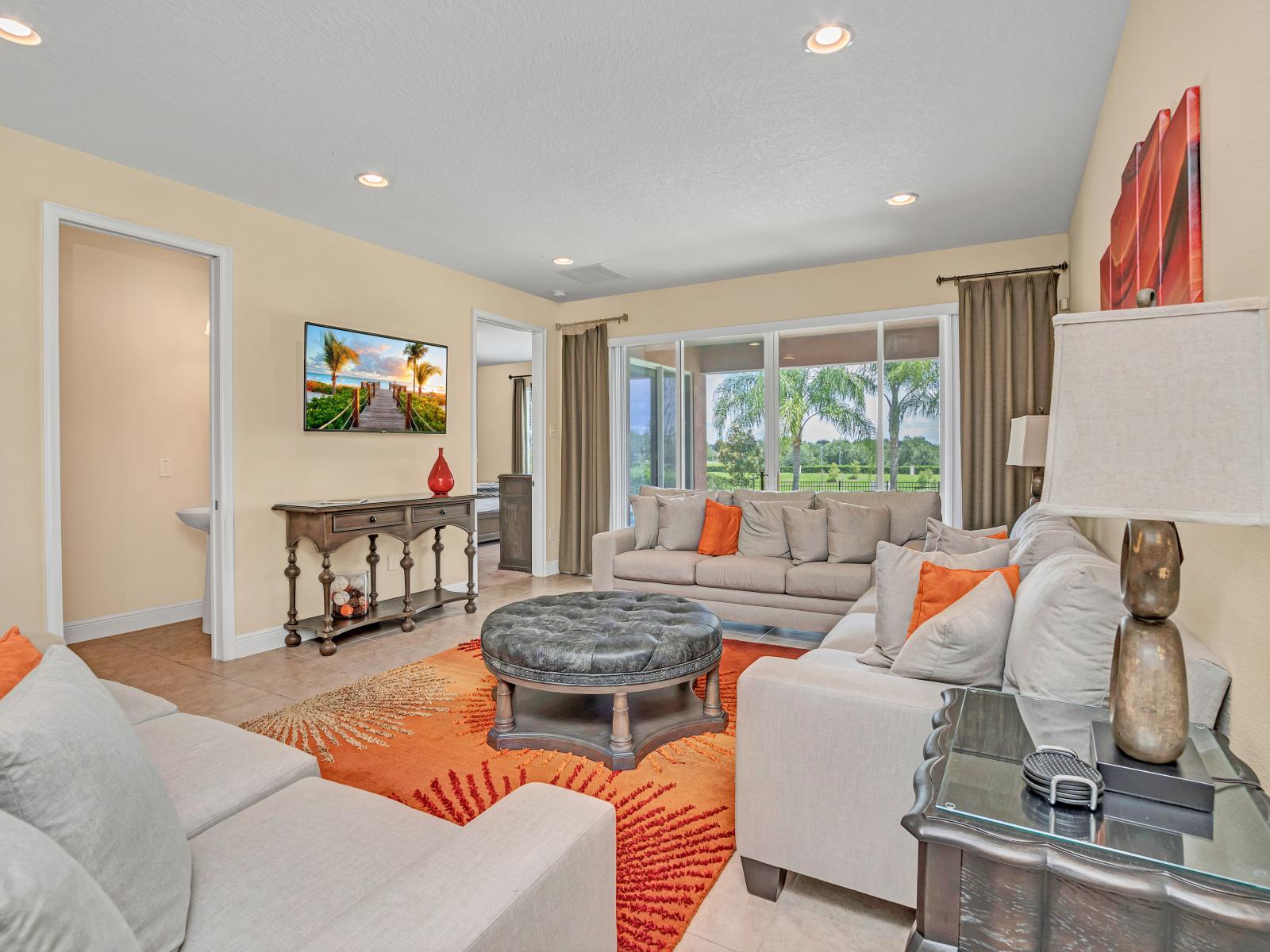 Spacious Living Area of the Home in Kissimmee Florida - Smart TV and Netflix - Plush seating arrangements invite relaxation and stylish gatherings